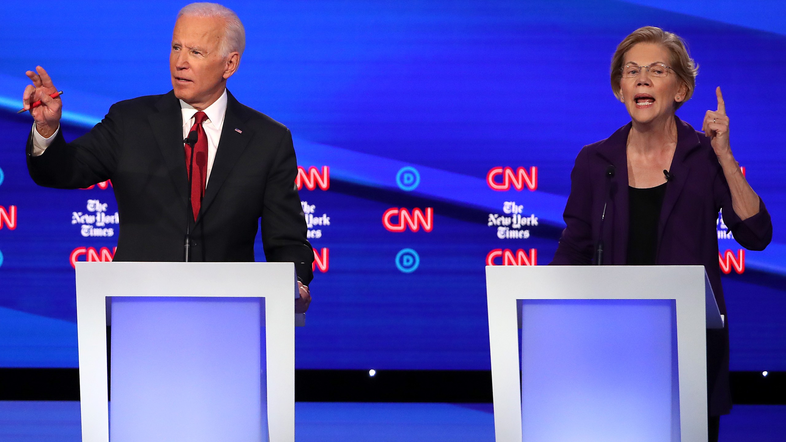 Former Vice President Joe Biden and Sen. Elizabeth Warren (D-MA) react during the Democratic Presidential Debate at Otterbein University on Oct. 15, 2019, in Westerville, Ohio. (Credit: Win McNamee/Getty Images)