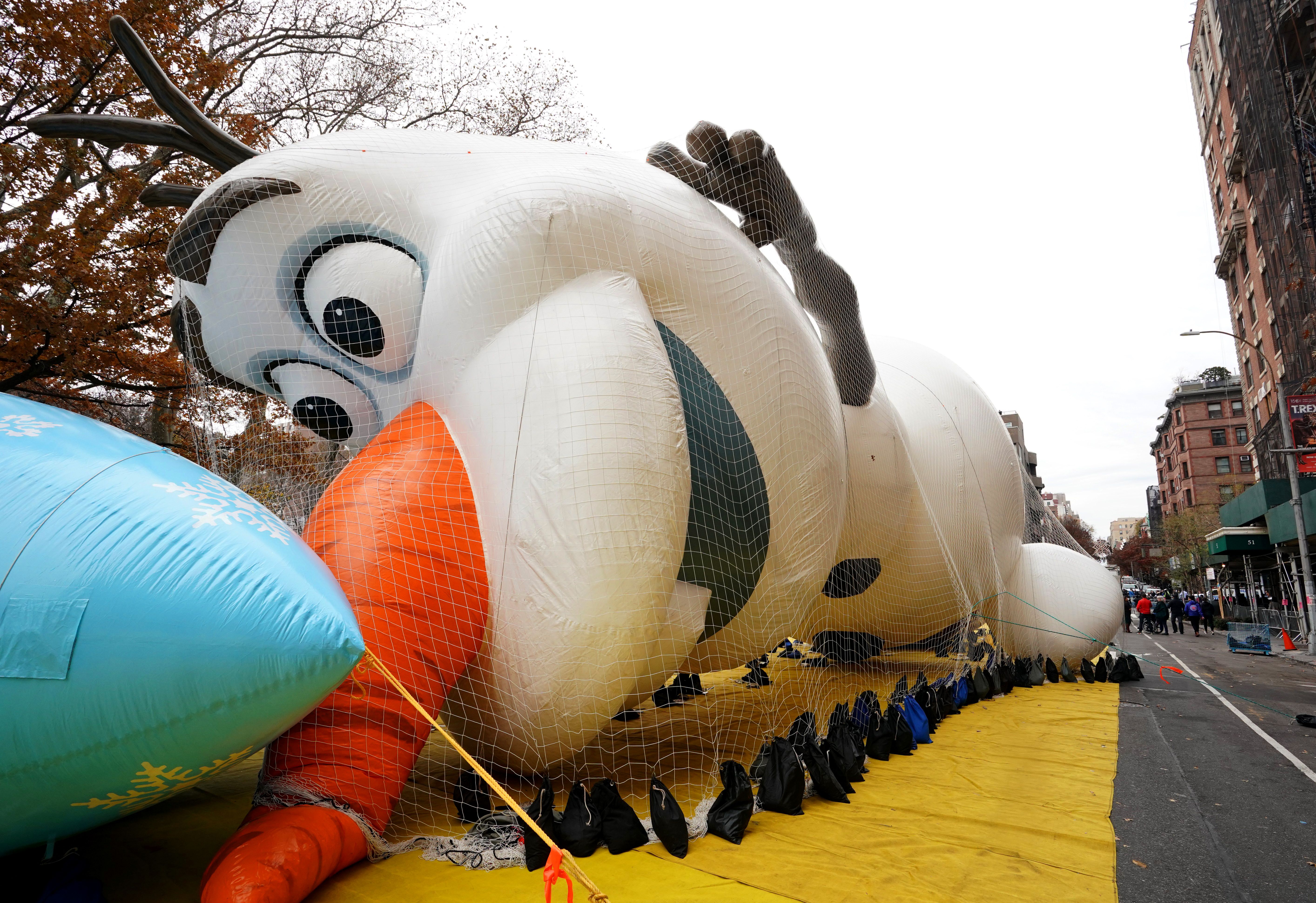 Olaf, a fictional character from Disney's Frozen, is pictured during the Macy's Thanksgiving Day Parade balloon inflation in New York City on Nov. 27, 2019. (Credit: TIMOTHY A. CLARY/AFP via Getty Images)