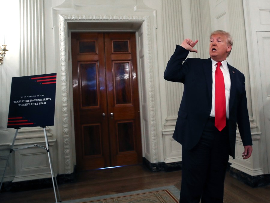 U.S. President Donald Trump briefly speaks to the media after greeting sports teams in the State Dining Room during the NCAA Collegiate National Champions Day on Nov. 22, 2019. (Credit: Mark Wilson/Getty Images)