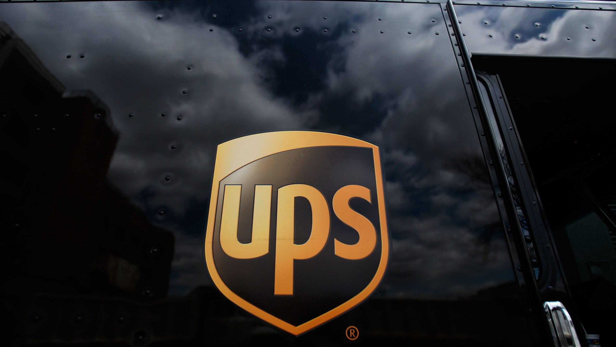 The United Parcel Service logo is emblazoned on the side of a delivery truck seen on April 23, 2009, in New York City. (Credit: Chris Hondros/Getty Images)