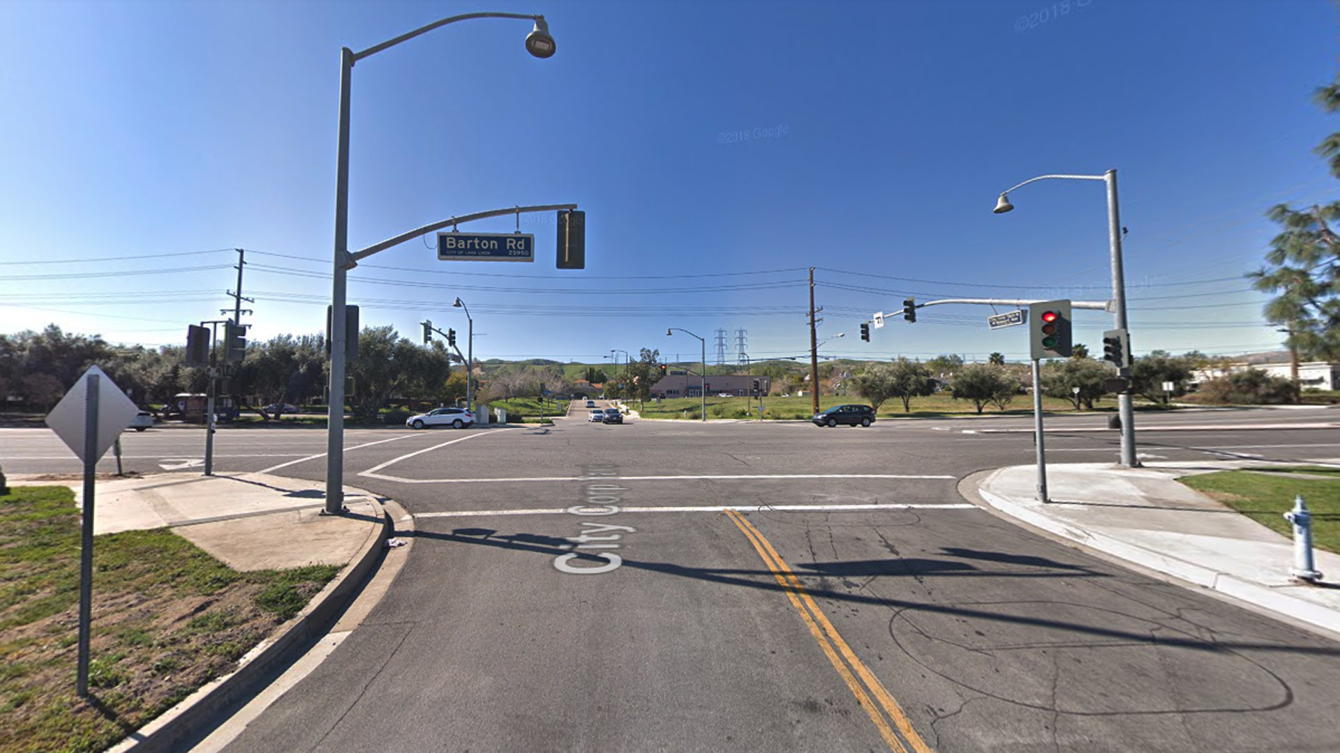 The intersection of Barton Road and Newport Avenue in Loma Linda, as viewed in a Google Street View image.