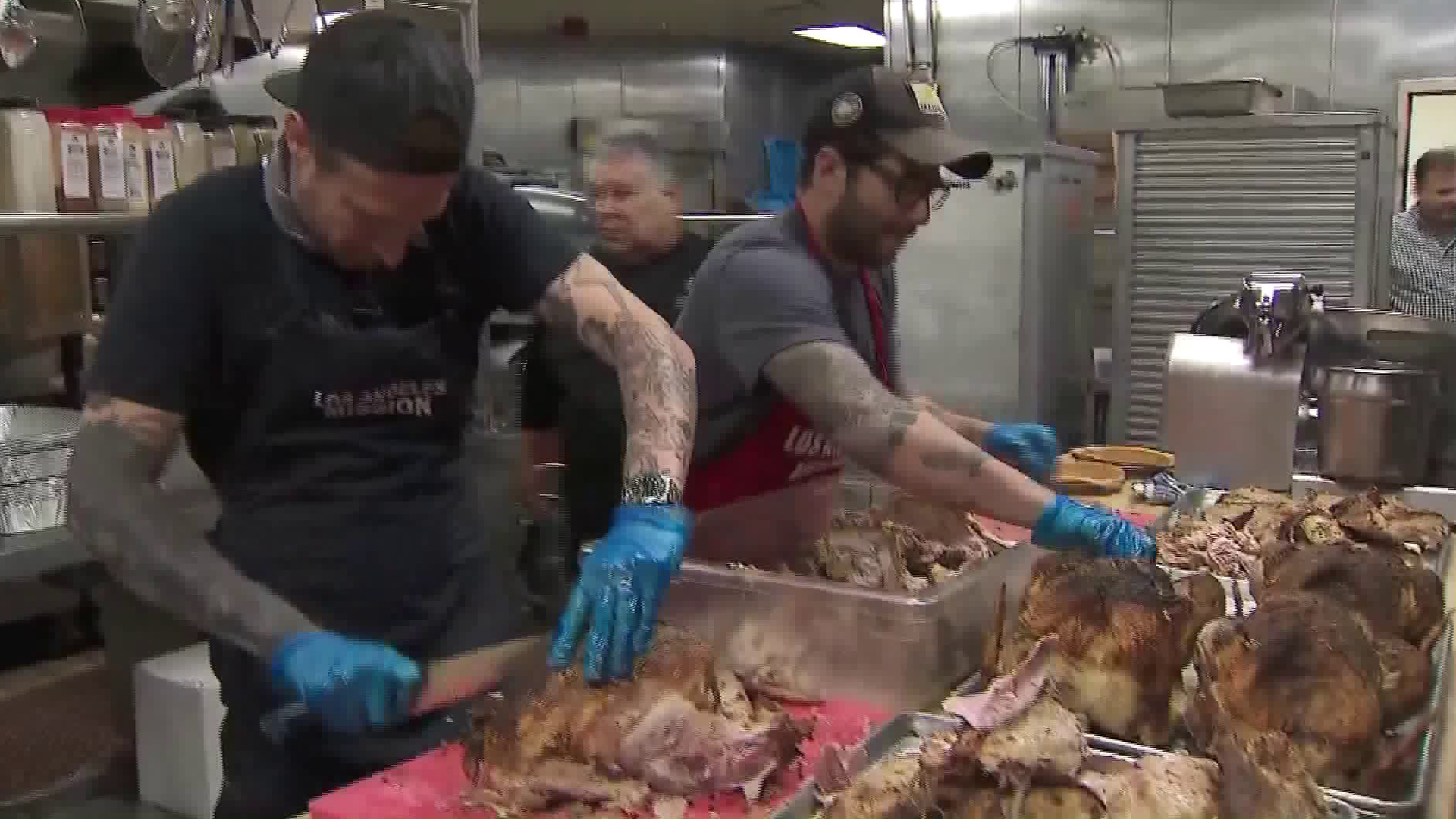 Volunteers with Los Angeles Mission are preparing meals to serve the community in Skid Row on Nov. 27, 2019. (Credit: KTLA)