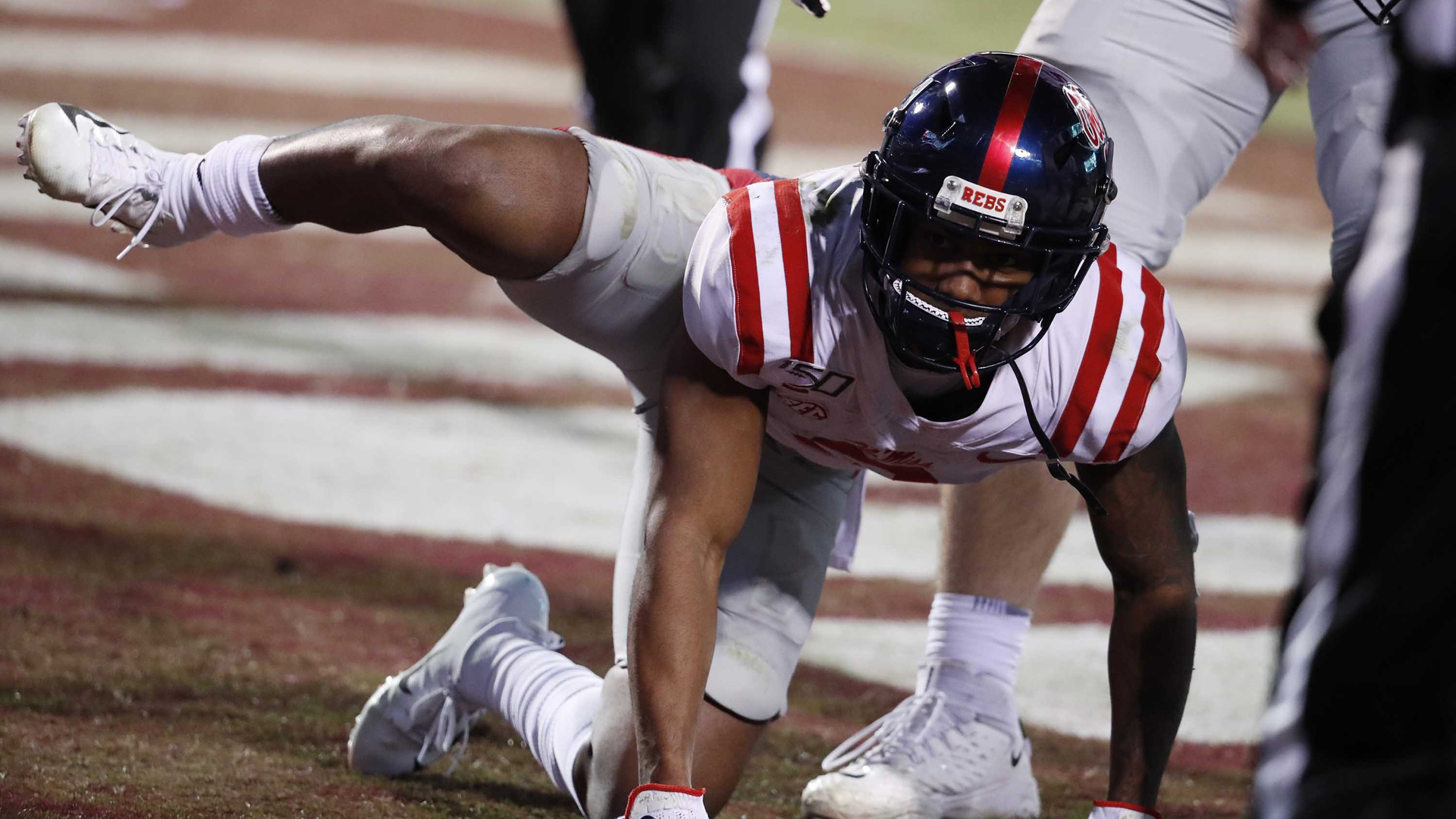 Mississippi wide receiver Elijah Moore reacts following a touchdown by his team against Mississippi State during the second half of an NCAA college football game in Starkville, Miss., on Nov. 28, 2019. (Credit: Rogelio V. Solis/AP)