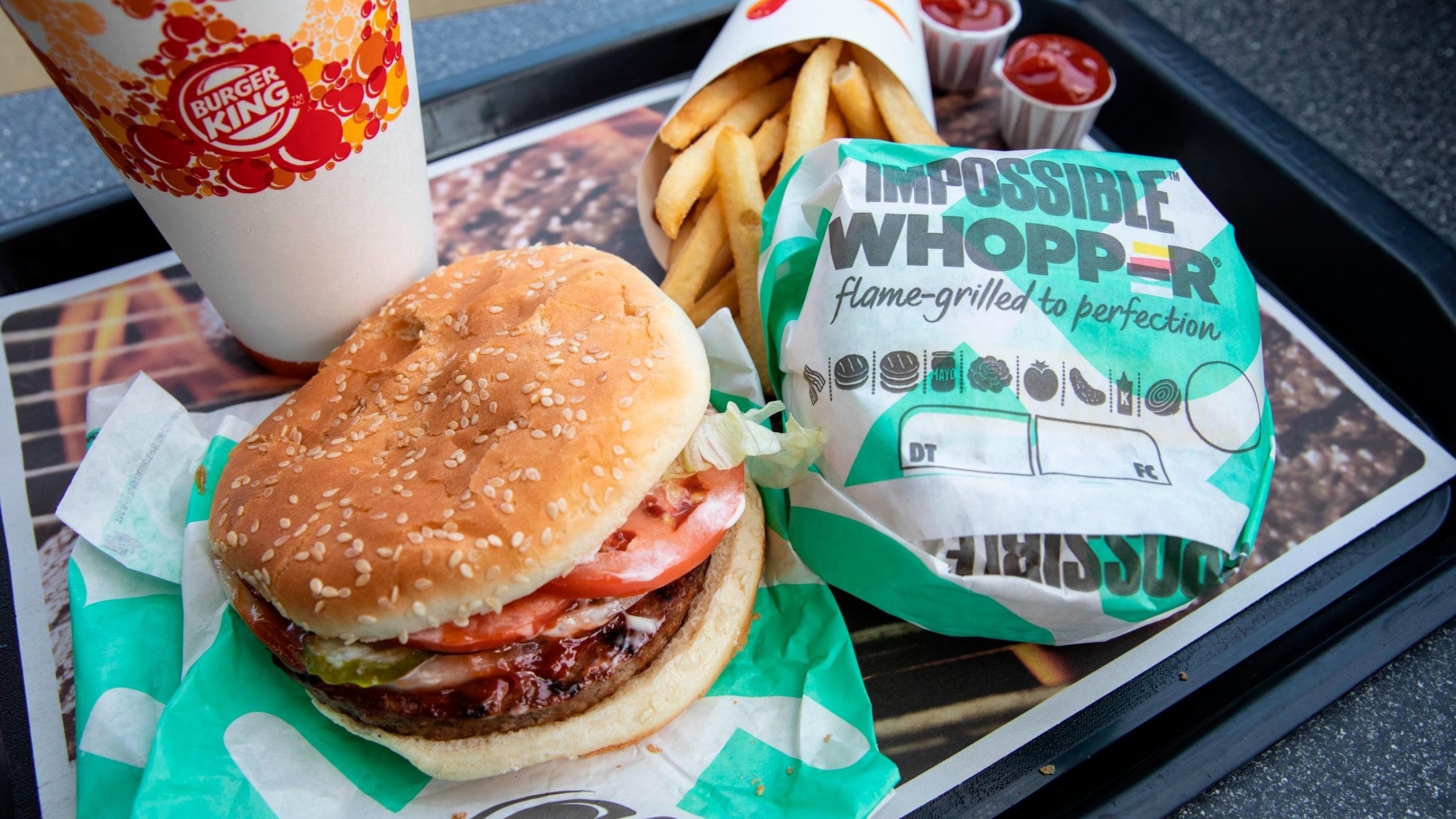 A man is suing Burger King because the meatless Impossible Whopper is cooked on the same grill as meat products, the lawsuit alleges. (Credit: Drew Angerer/Getty Images)