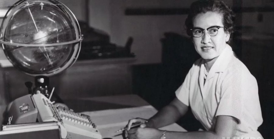 NASA mathematician Katherine Johnson is seen sitting at her desk at the NASA Langley Research Center in this photo from the '60s. (Credit: Sean Smith/NASA via CNN)