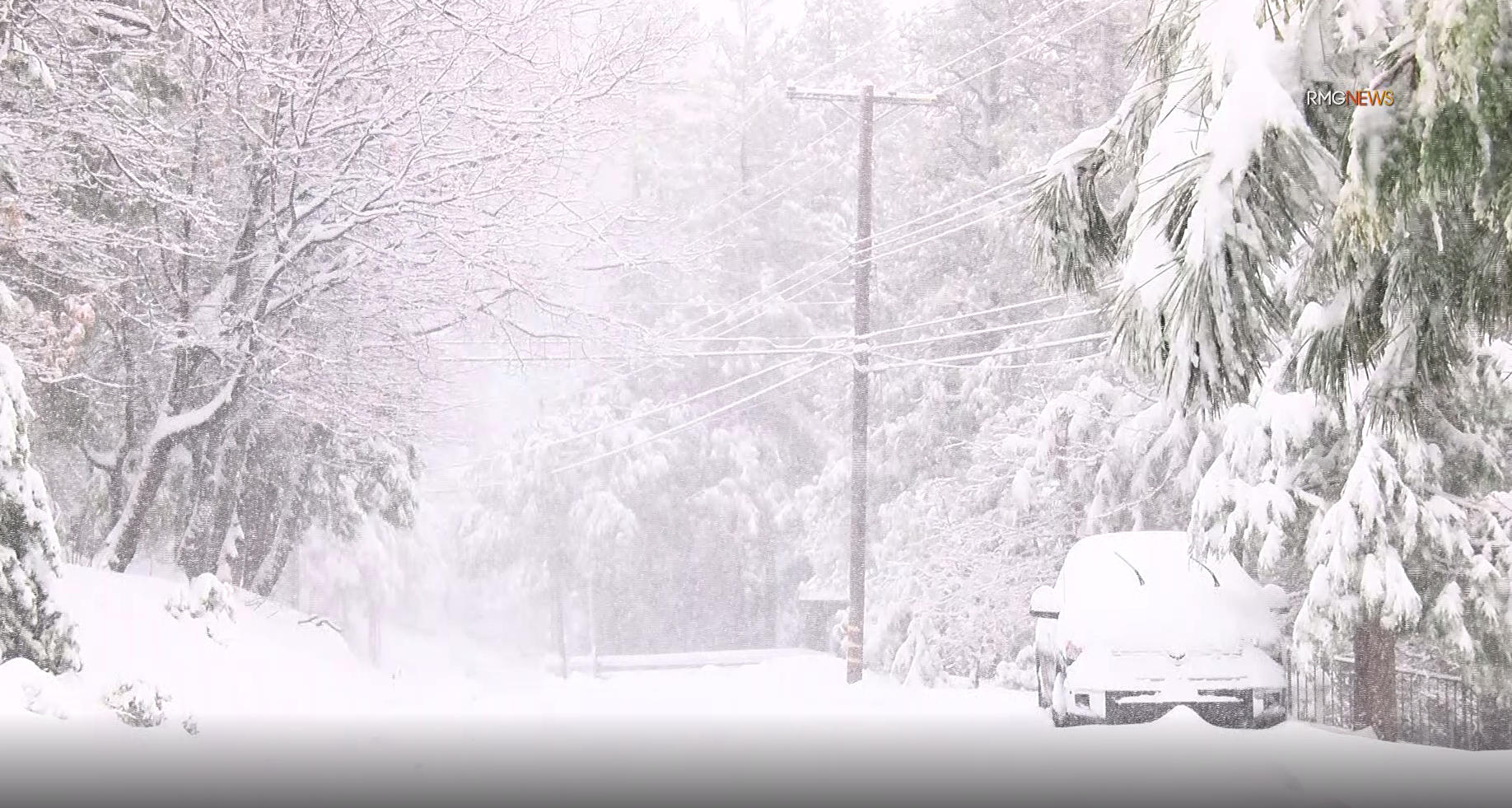 Snow blankets a roadway and electrical wires in the Lake Arrowhead area on Nov. 28, 2019. (Credit: RMG News)