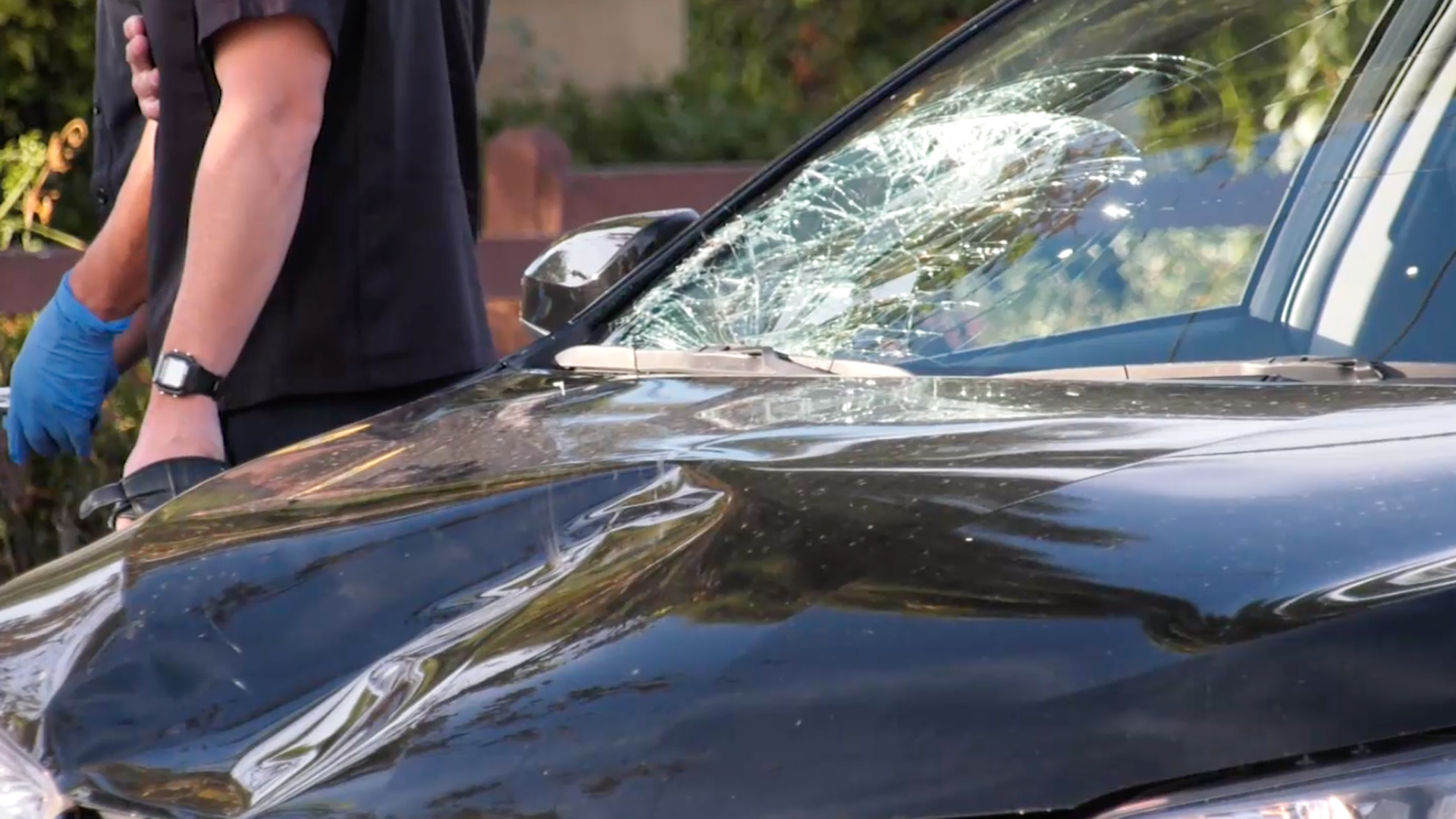 A car that hit a teenager crossing the street is shown on Nov. 18, 2019. (Credit: ONSCENETV)