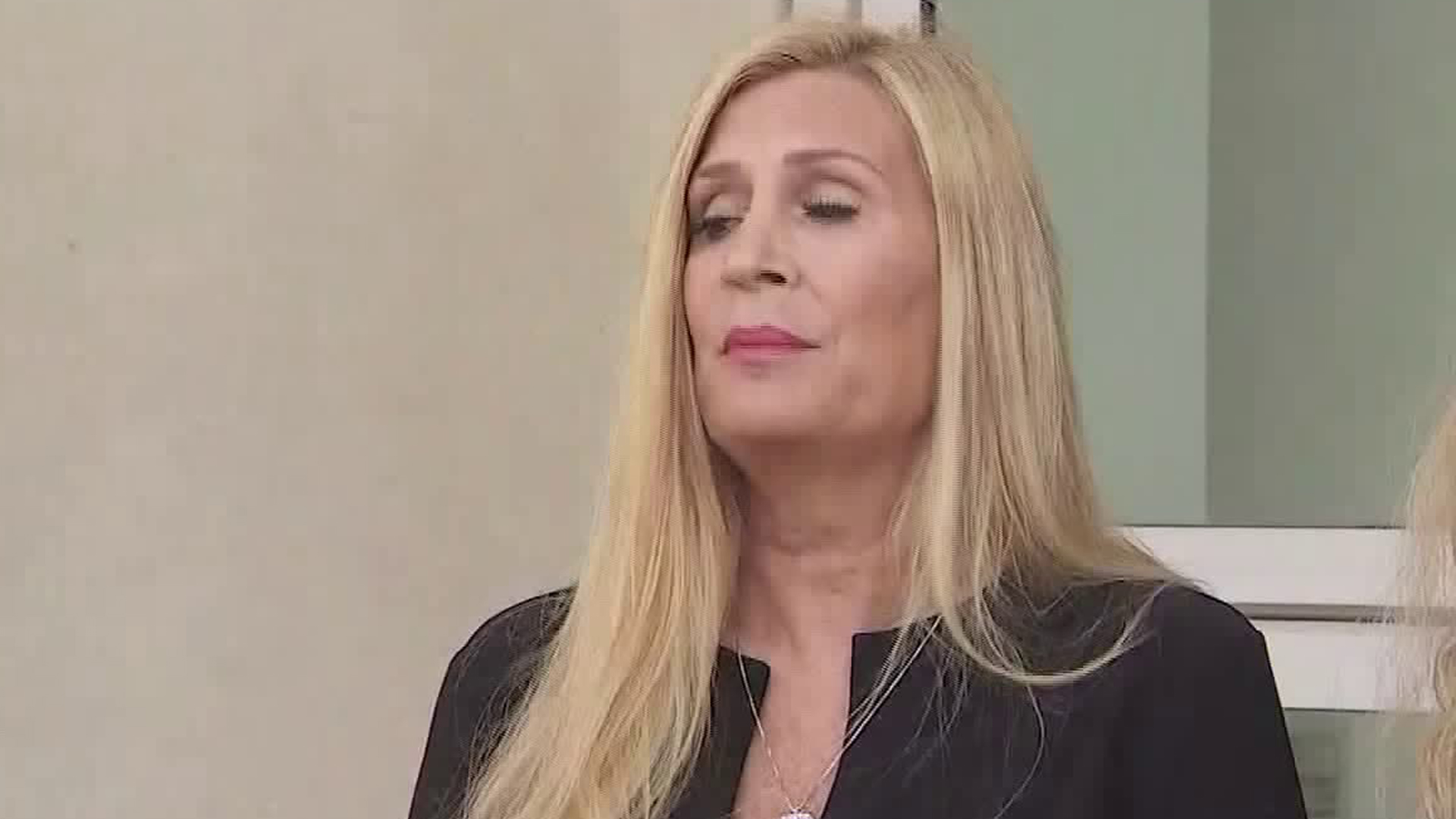 A woman who only identified herself as Julie detailed allegations against James Heaps, a former gynecologist for the University of California Los Angeles, at a news conference in Del Aire on Nov. 6, 2019. (Credit: KTLA)