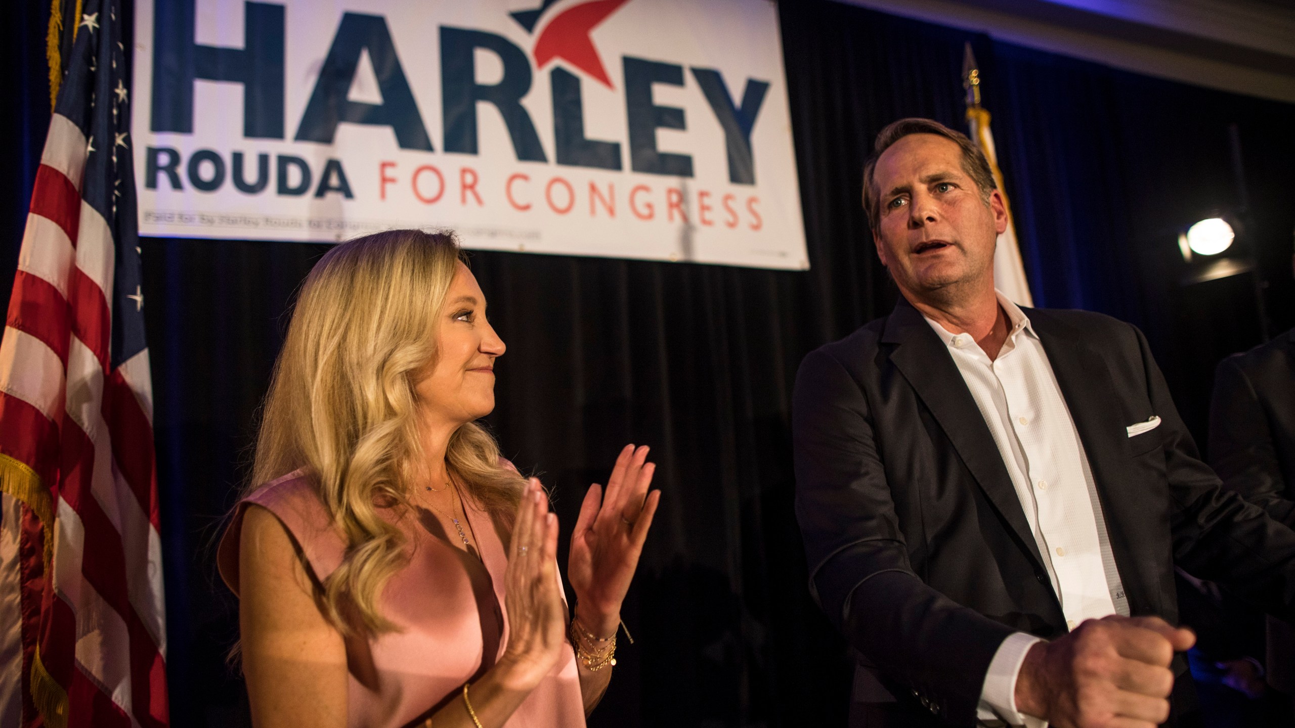 Harley Rouda, right, speaks to supporters with his family during their election day party on Nov. 6, 2018 in Newport Beach. (Credit: Barbara Davidson/Getty Images)