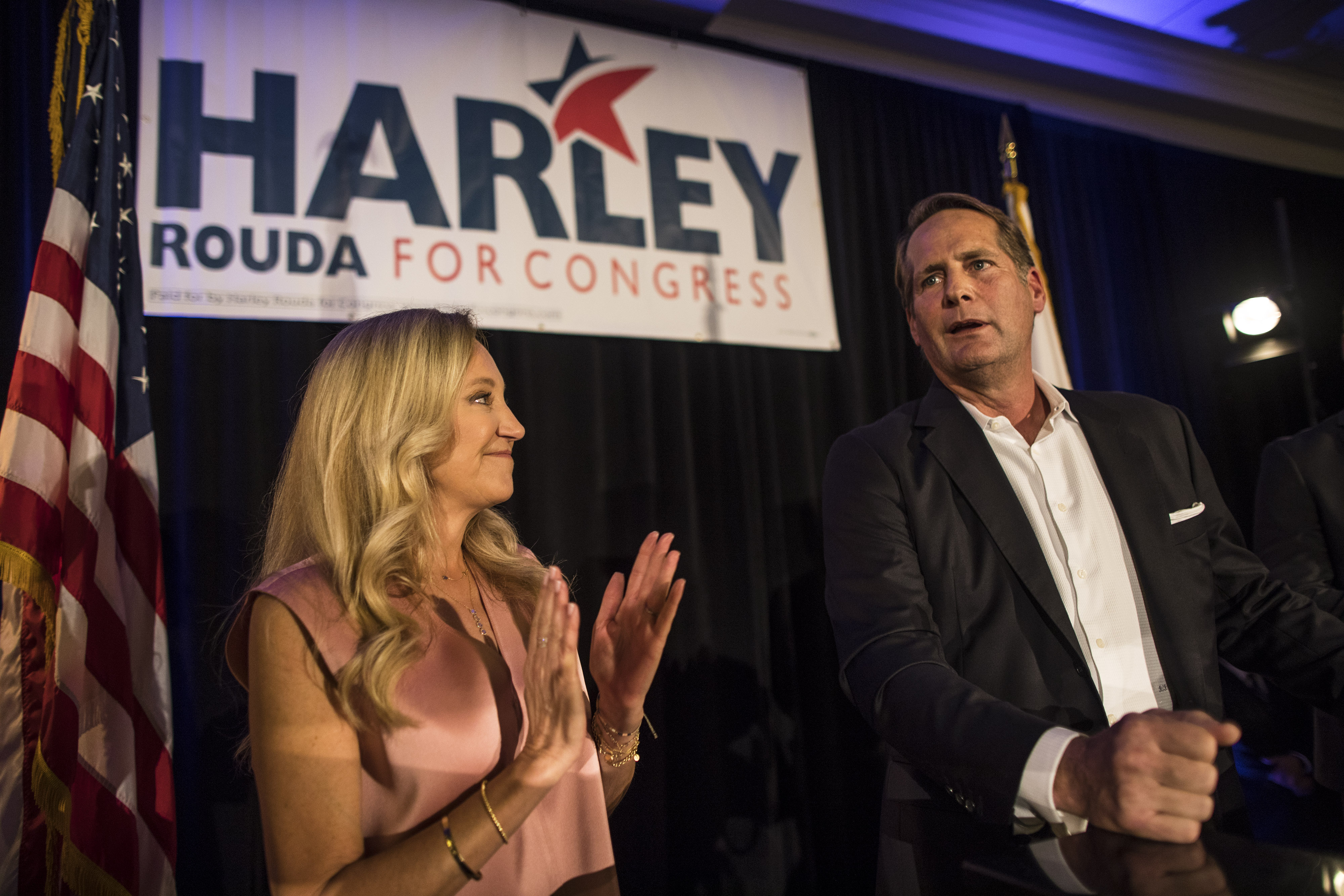 Harley Rouda, right, speaks to supporters with his family during their election day party on Nov. 6, 2018 in Newport Beach. (Credit: Barbara Davidson/Getty Images)