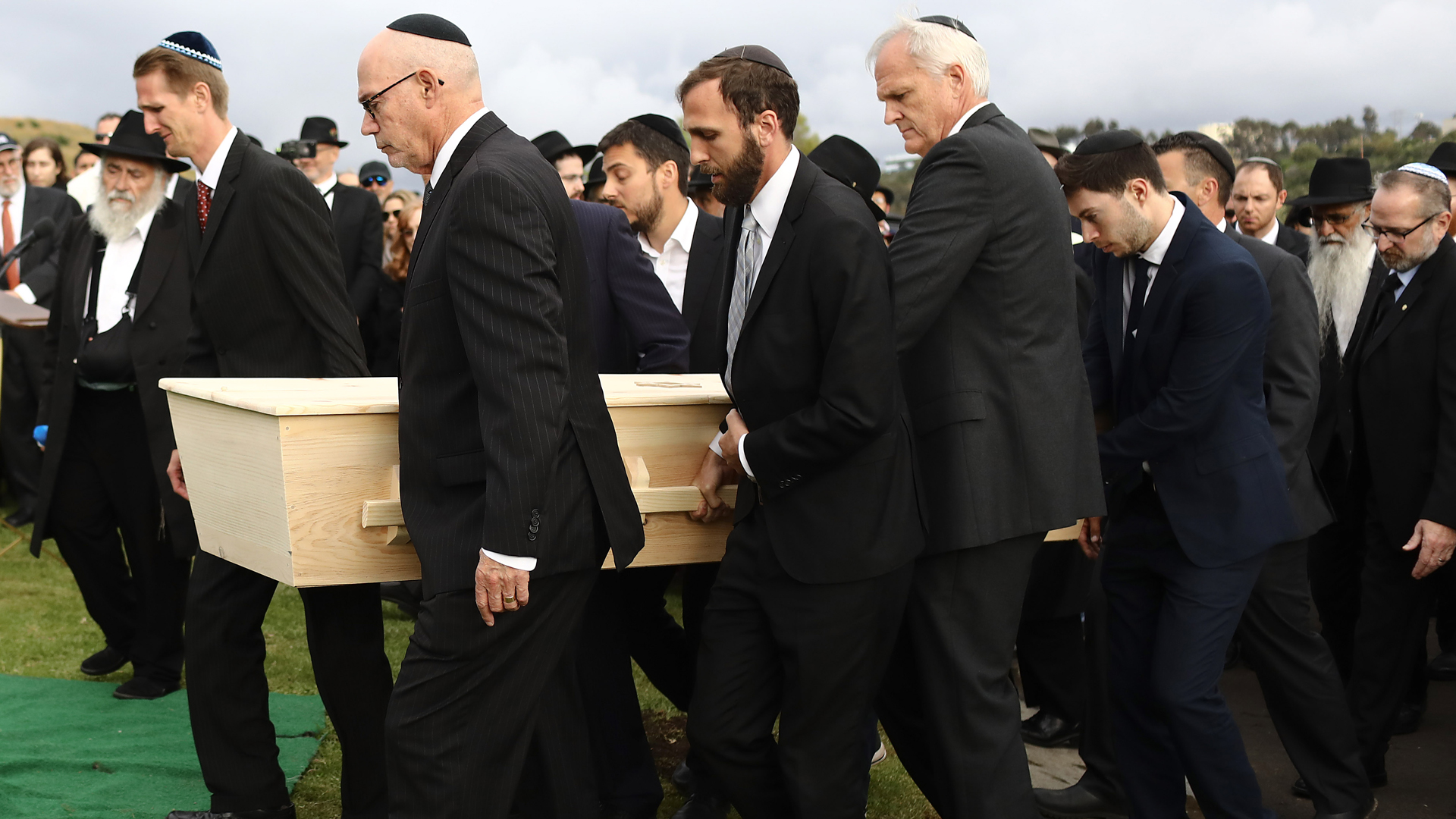 Pallbearers carry the casket of Chabad of Poway synagogue shooting victim Lori Gilbert Kaye during a graveside service on April 29, 2019, in San Diego, California. (Credit: Mario Tama/Getty Images)