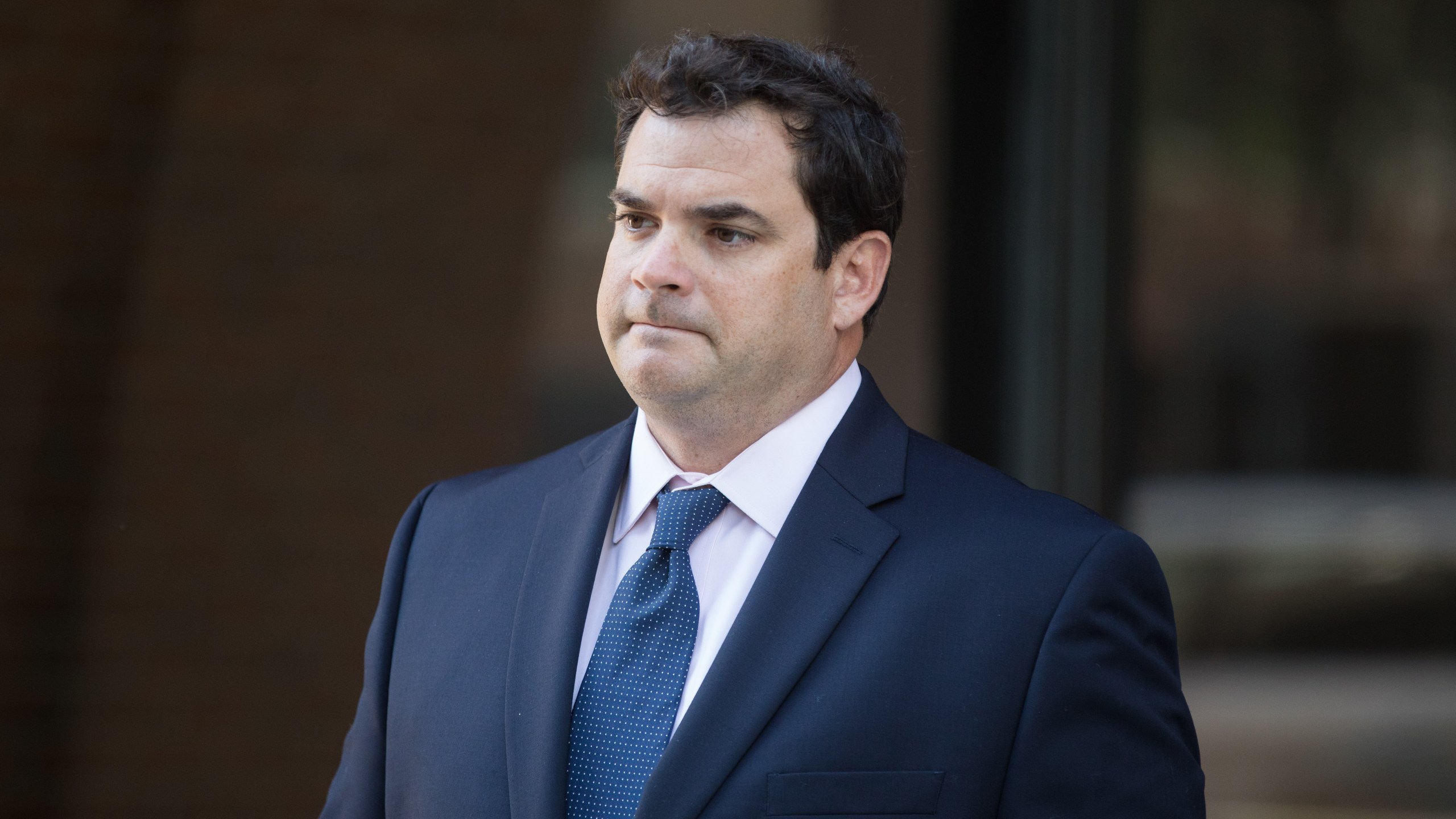 Former Stanford University sailing coach John Vandemoer leaves a federal courthouse in Boston following his sentencing on June 12, 2019. (Credit: Scott Eisen / Getty Images)