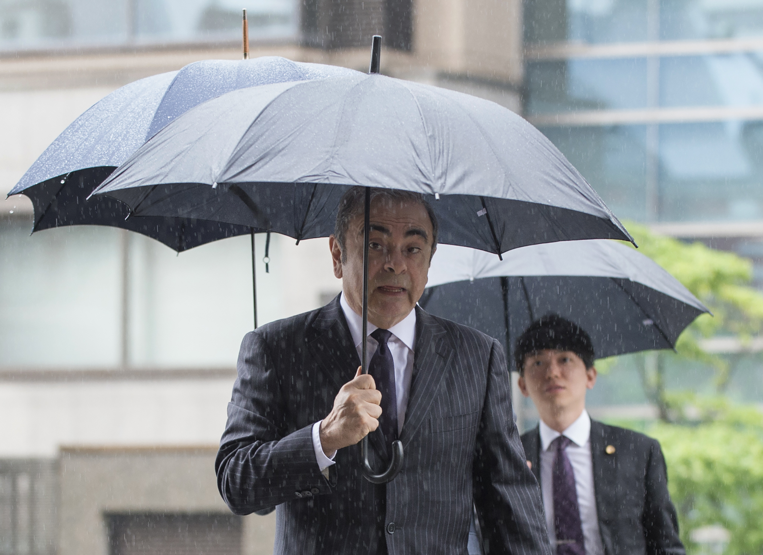 Former Nissan Motor Chairman Carlos Ghosn arrives for a pre-trial hearing at the Tokyo District Court in Tokyo on June 24, 2019. (Credit: KAZUHIRO NOGI/AFP via Getty Images)