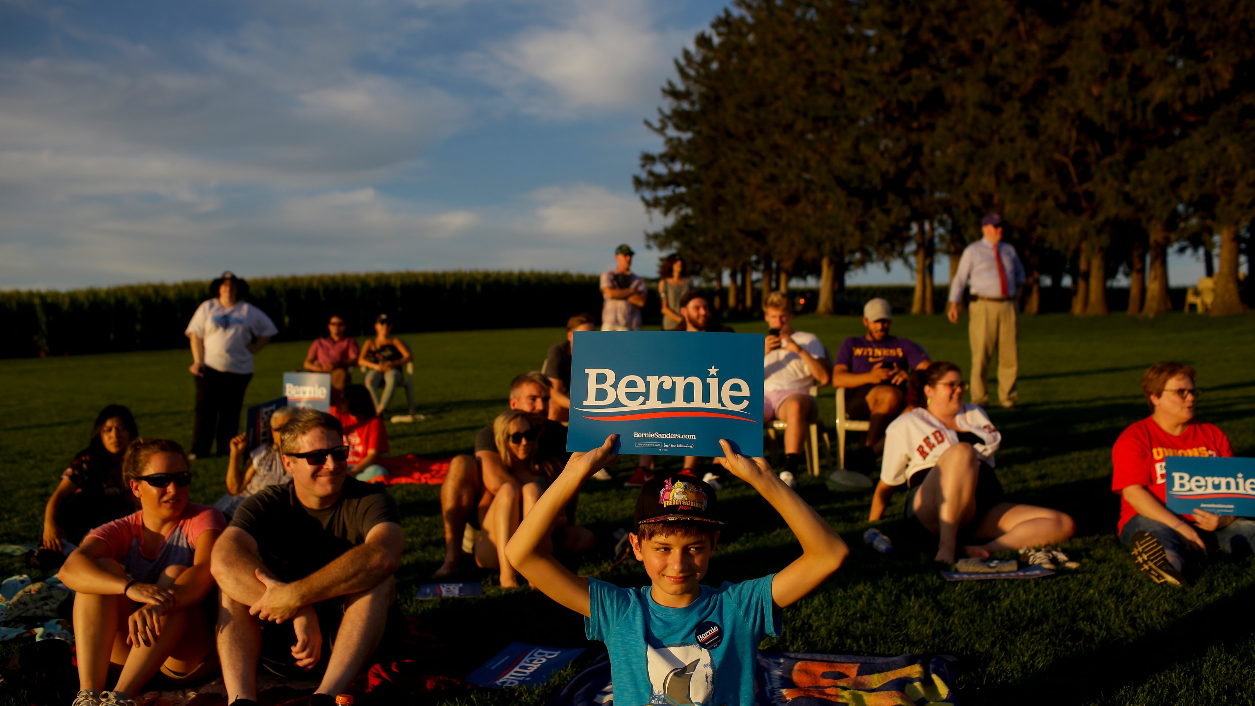 People attend Democratic presidential candidate Sen. Bernie Sanders' baseball game on Aug. 19, 2019 (Credit: Joshua Lott/Getty)