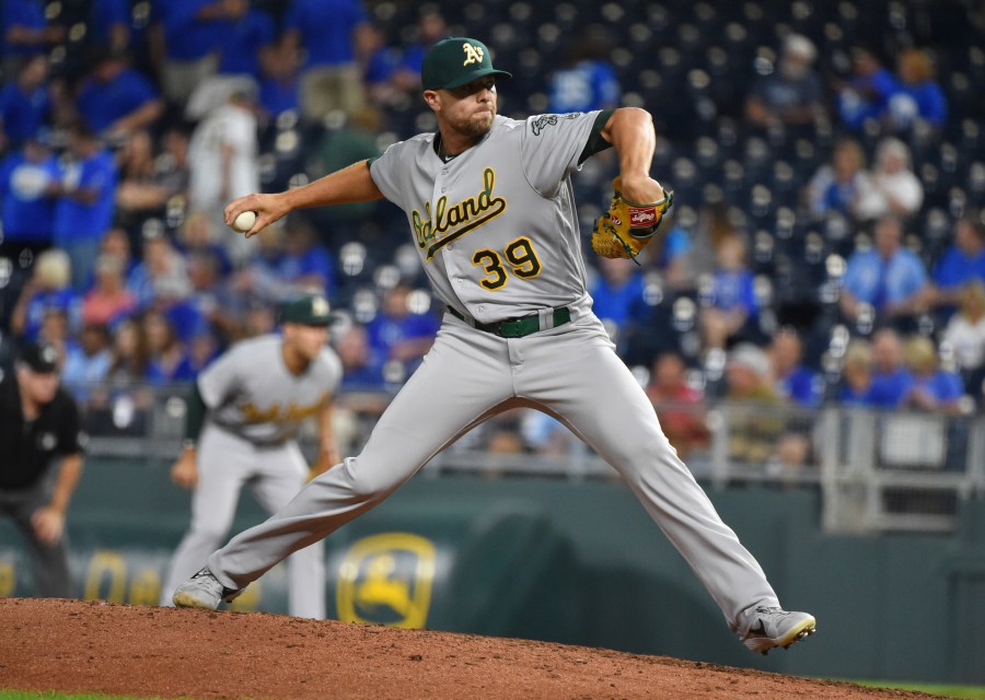 Relief pitcher Blake Treinen #39 of the Oakland Athletics throws in the eighth inning against the Kansas City Royals at Kauffman Stadium on Aug. 28, 2019, in Kansas City, Missouri. (Credit: Ed Zurga/Getty Images)