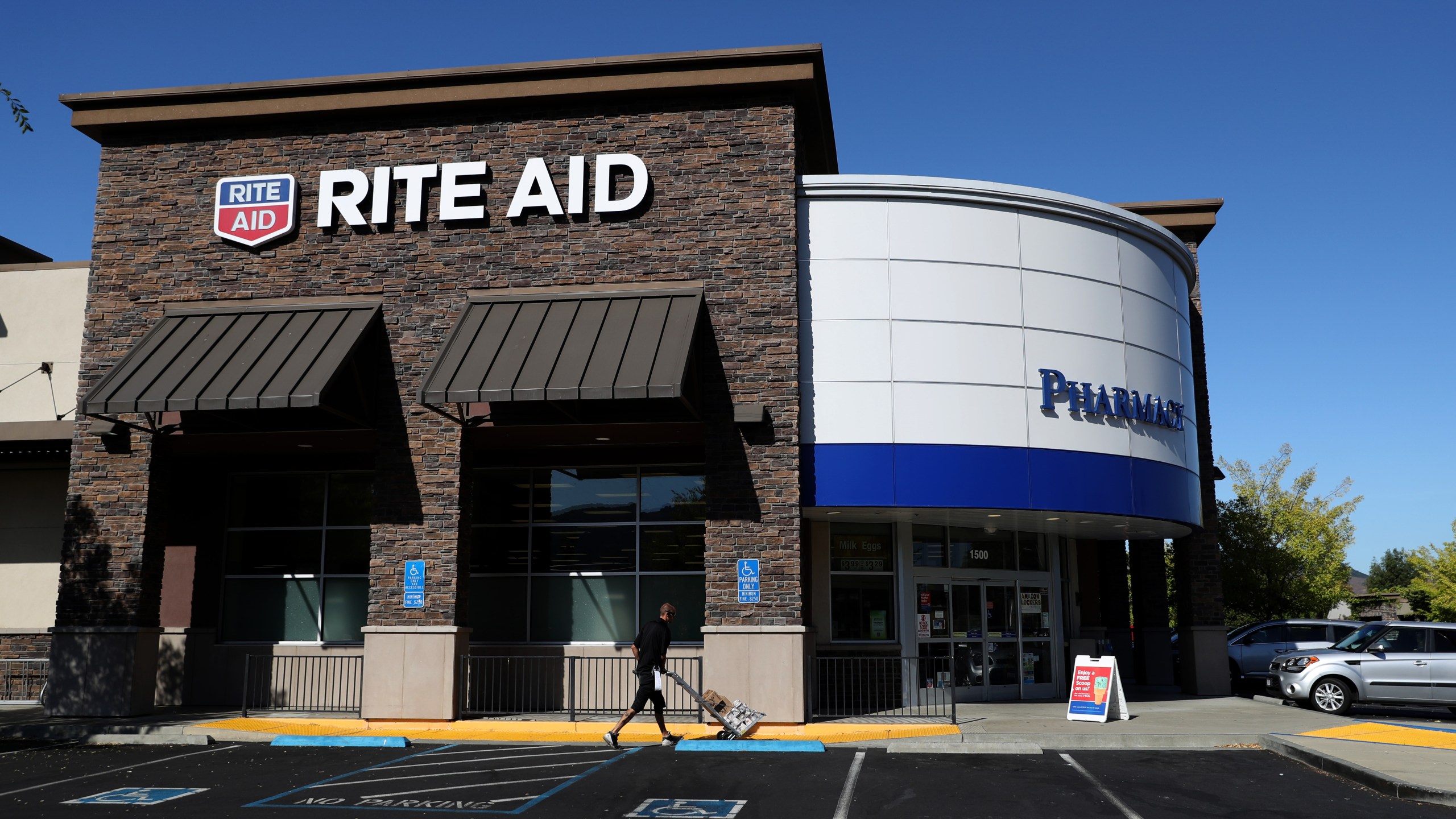 The Rite Aid logo is displayed on the exterior of a Rite Aid pharmacy on September 26, 2019 in California. (Credit: Justin Sullivan/Getty Images)