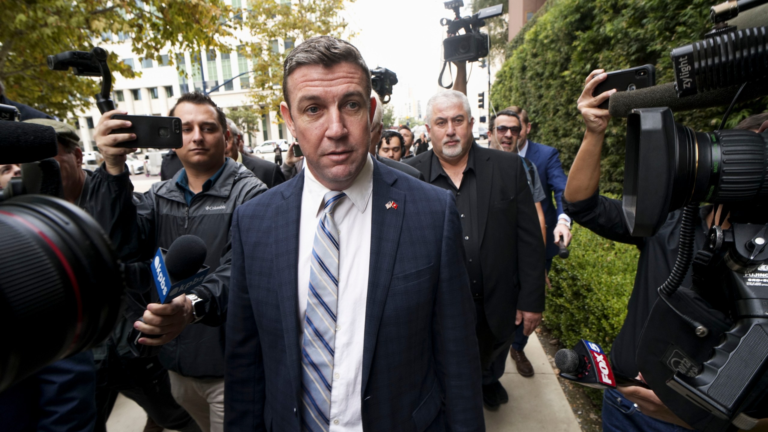 Rep. Duncan Hunter walks into a federal courthouse in San Diego on Dec. 3, 2019. (Credit: Sandy Huffaker / Getty Images)