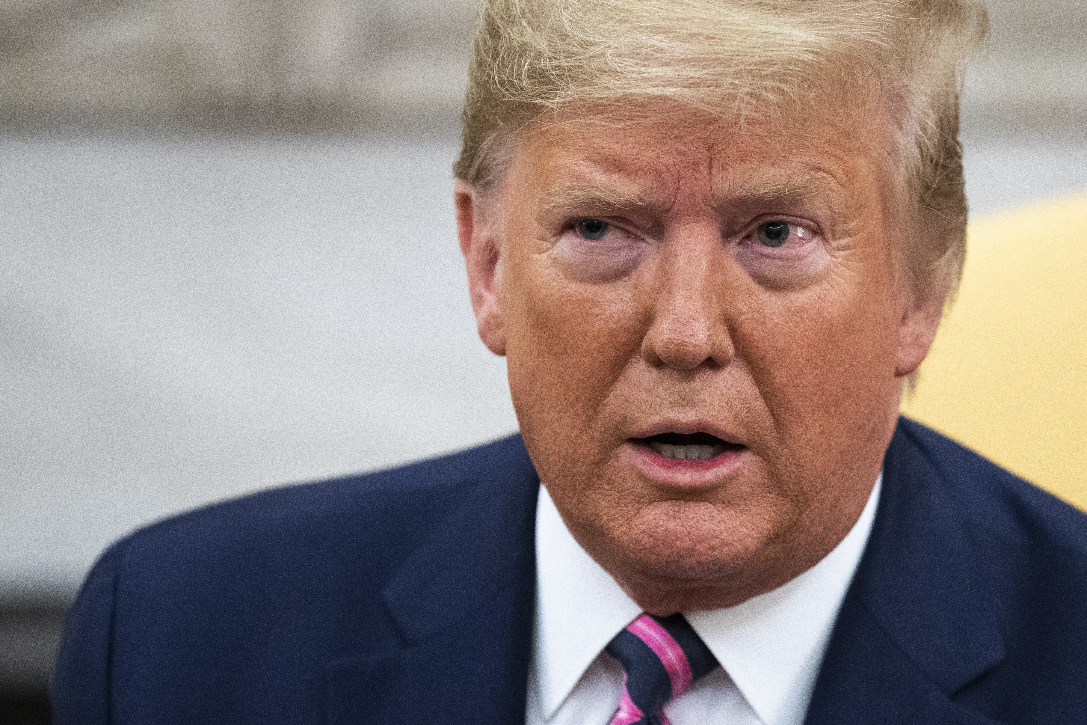 U.S. President Donald Trump speaks to reporters in the Oval Office of the White House on December 19, 2019 in Washington, DC. (Credit: Drew Angerer/Getty Images)