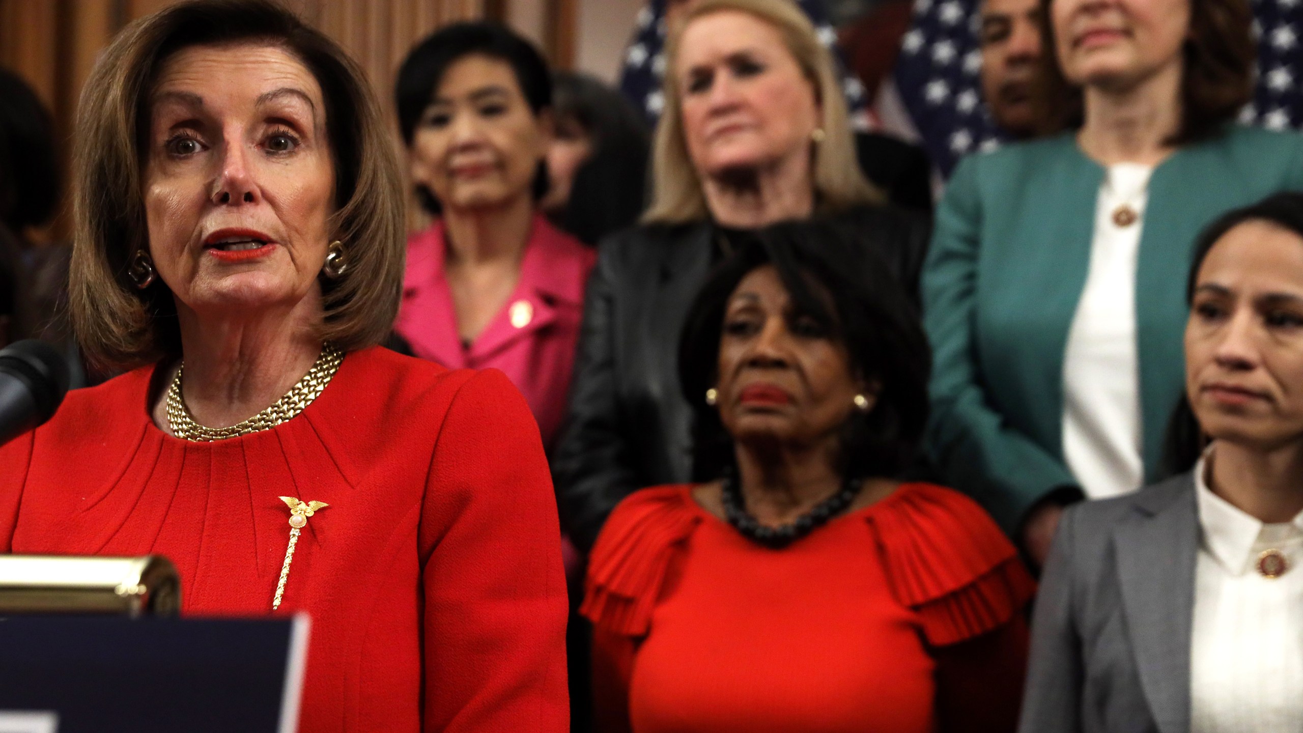 U.S. Speaker of the House Rep. Nancy Pelosi (D-CA) speaks as other House Democrats look on during an event at the Rayburn Room of the U.S. Capitol Dec. 19, 2019, in Washington, D.C. (Credit: Alex Wong/Getty Images)