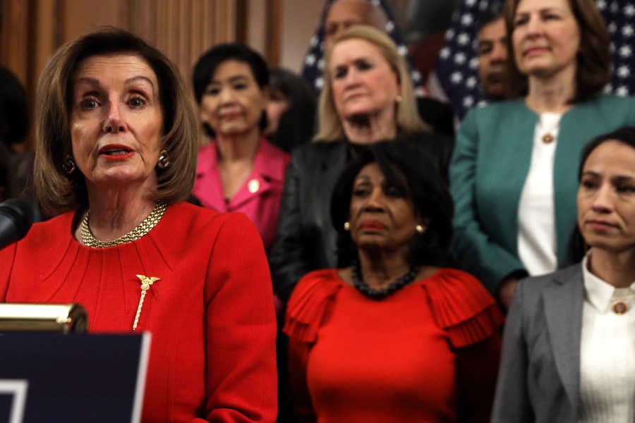 U.S. Speaker of the House Rep. Nancy Pelosi (D-CA) speaks as other House Democrats look on during an event at the Rayburn Room of the U.S. Capitol Dec. 19, 2019, in Washington, D.C. (Credit: Alex Wong/Getty Images)