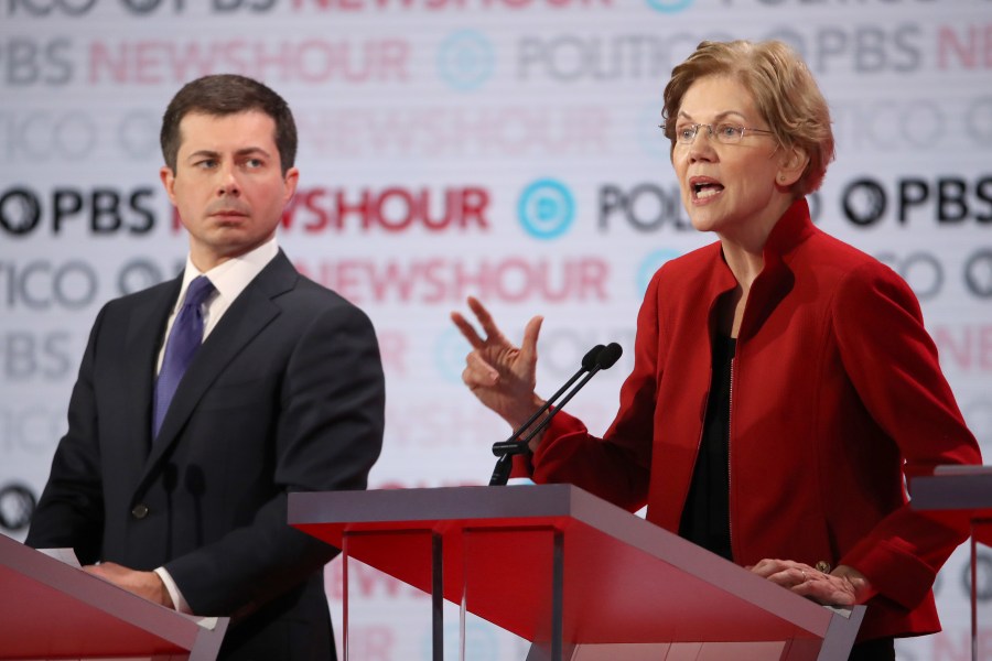 Sen. Elizabeth Warren (D-MA) speaks as South Bend, Indiana Mayor Pete Buttigieg listens during the Democratic presidential primary debate at Loyola Marymount University on Dec. 19, 2019. (Credit: Justin Sullivan/Getty Images)