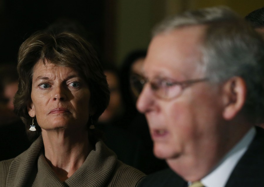 Sen. Lisa Murkowski (R-AK) listens to Senate Majority Leader Mitch McConnell (R-KY) speak to the media after the weekly Senate Policy Luncheon on Capitol Hill on Jan. 27, 2016 in Washington, D.C. (Credit: Mark Wilson/Getty Images)