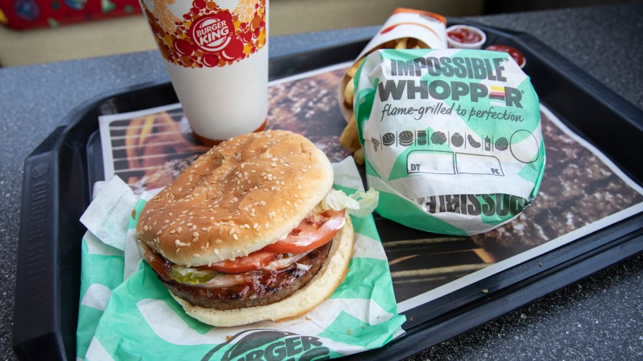 In this photo illustration, the new Impossible Whopper sits on a table at a Burger King restaurant on August 8, 2019, in Brooklyn, New York. (Credit: Drew Angerer/Getty Images)