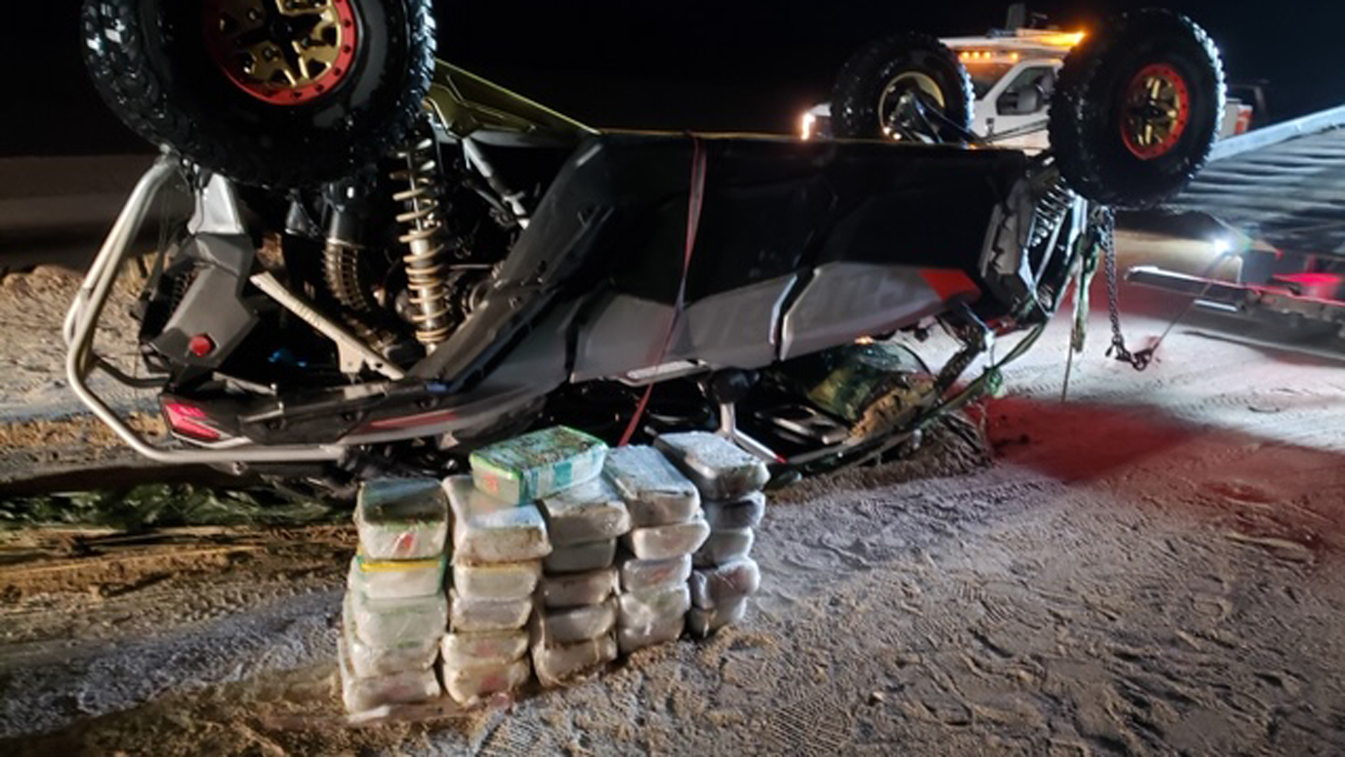 A photo of a damaged off-road vehicle used to retrieve methamphetamine near the Salton Sea is seen in a photo released by the U.S. Attorney’s Office for the Central District of California on Dec. 16, 2019.