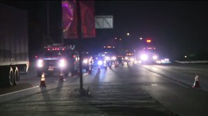 Traffic was diverted off the 5 Freeway in Carlsbad after a wrong-way crash killed two drivers, including a possible service member, on Jan. 14, 2020. (Credit: KSWB) 