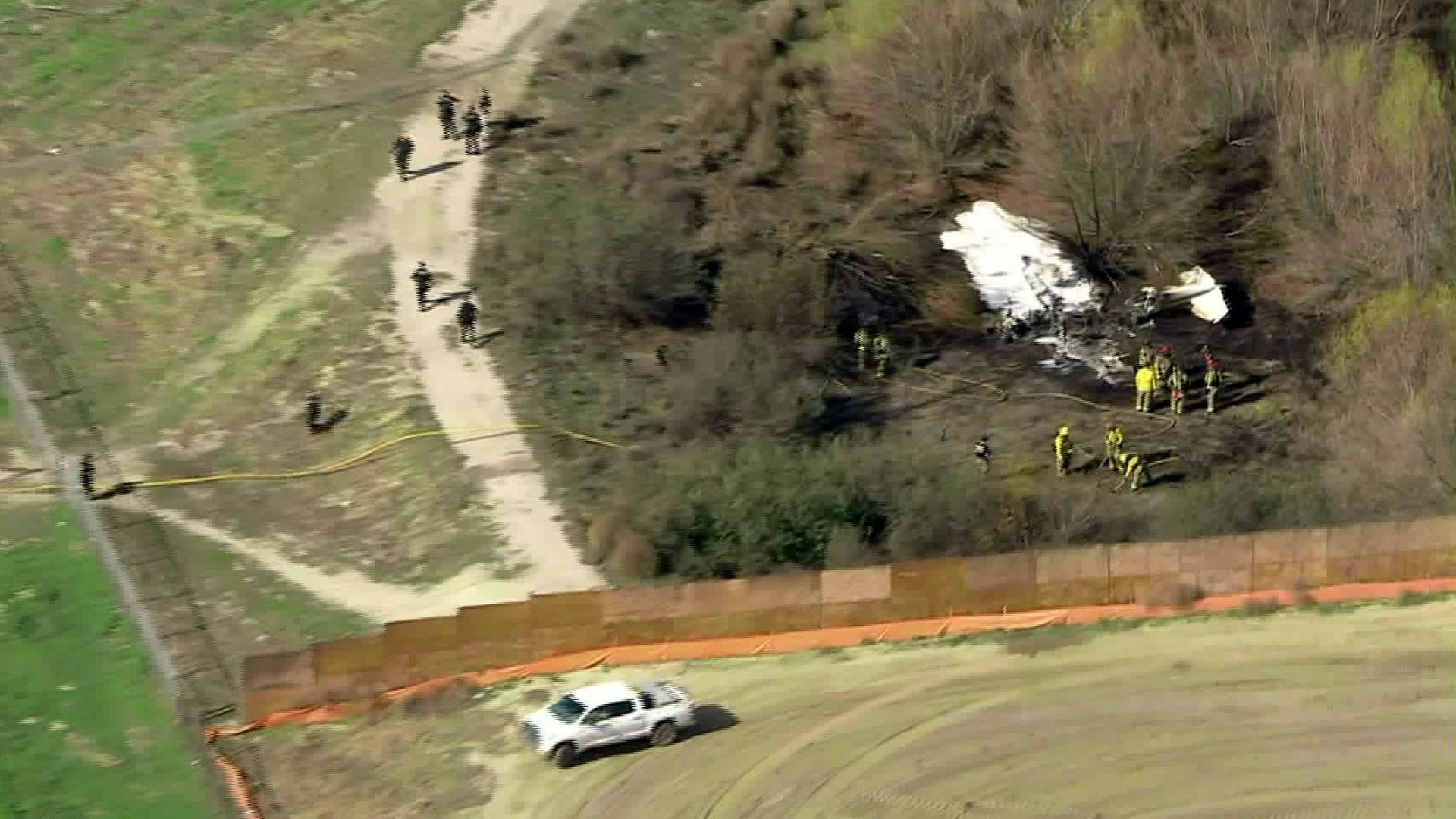 Firefighters respond to a plane crash in Corona on Jan. 22, 2020. (Credit: KTLA)