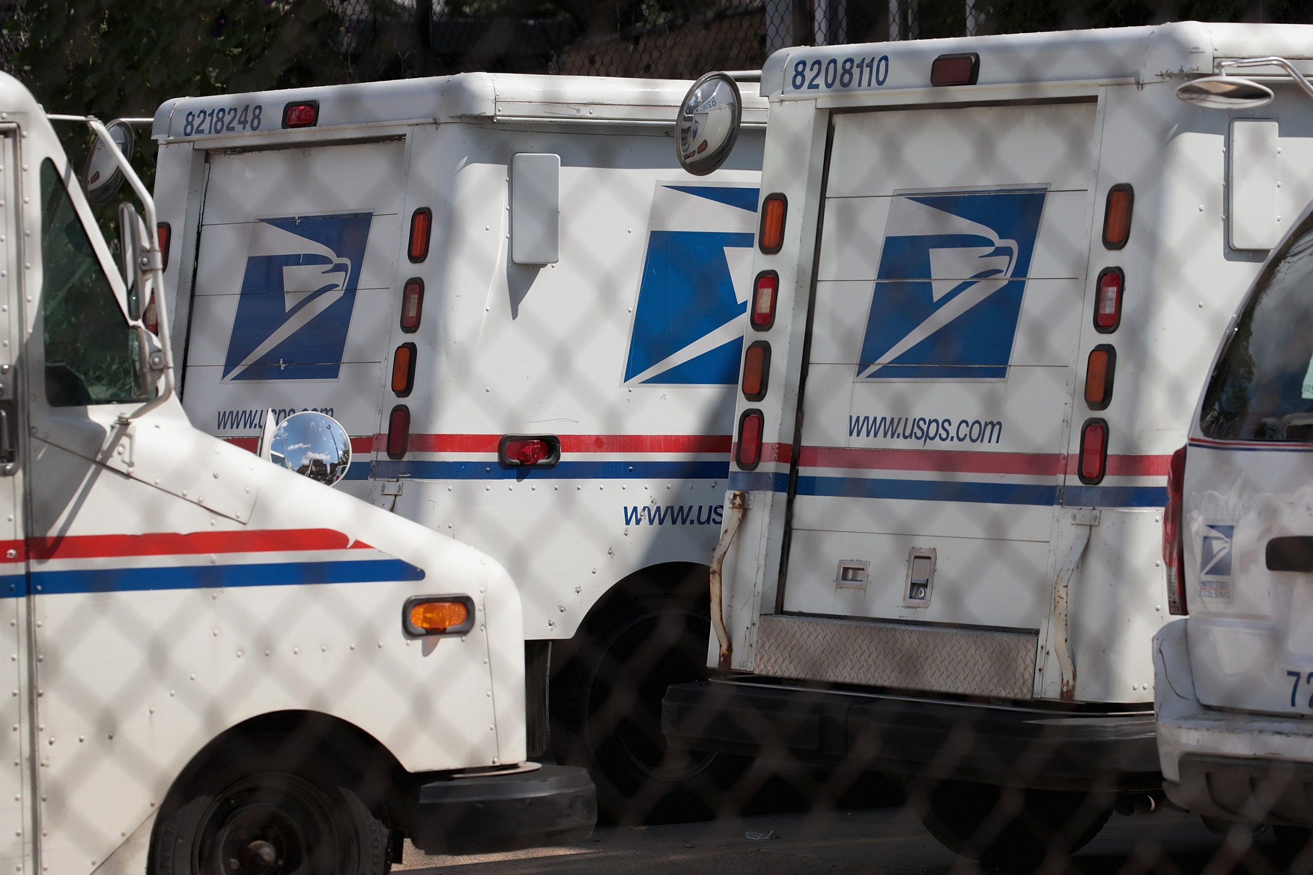 United States Postal Service (USPS) trucks are parked at a postal facility on August 15, 2019 in Chicago, Illinois. (Credit: Scott Olson/Getty Images)