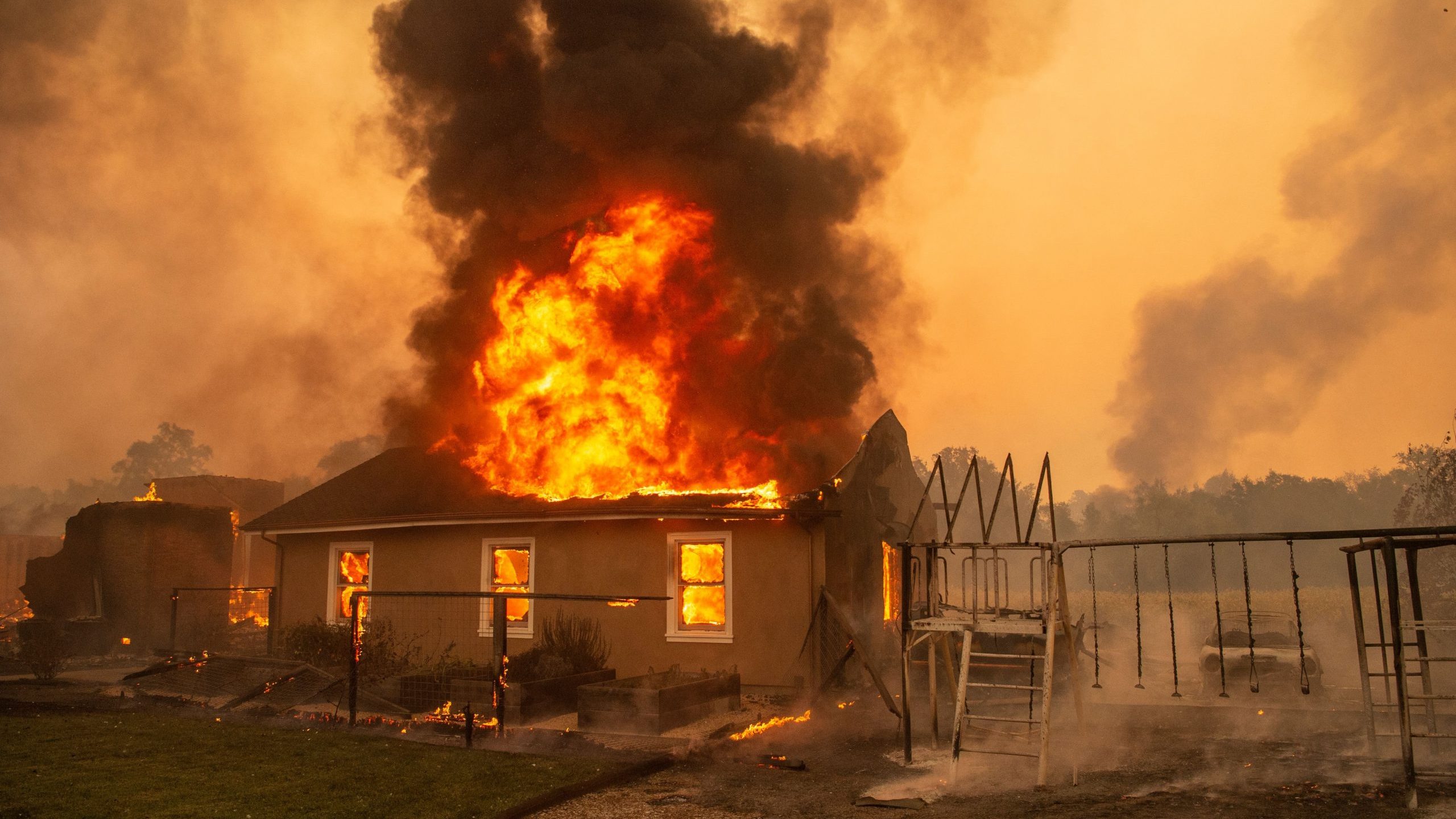 A home burns at a vineyard near Geyserville during the Kincade Fire on Oct. 24, 2019. (Josh Edelson / AFP / Getty Images)