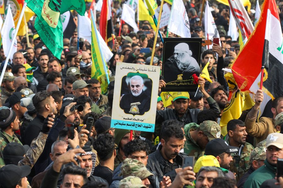 Supporters of the Hashed al-Shaabi paramilitary force and Iraq's Hezbollah brigades attend the funeral of Iranian military commander Qassem Soleimani in Baghdad's district of al-Jadriya on Jan. 4, 2020. (Credit: AHMAD AL-RUBAYE/AFP via Getty Images)