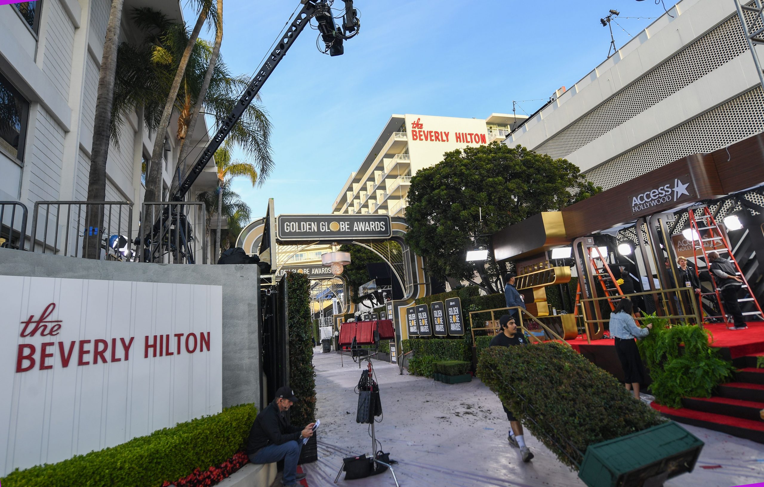 Crews set up the red carpet for the Golden Globes 2020 at The Beverly Hilton on Jan. 4, 2020. (Credit: VALERIE MACON/AFP via Getty Images)