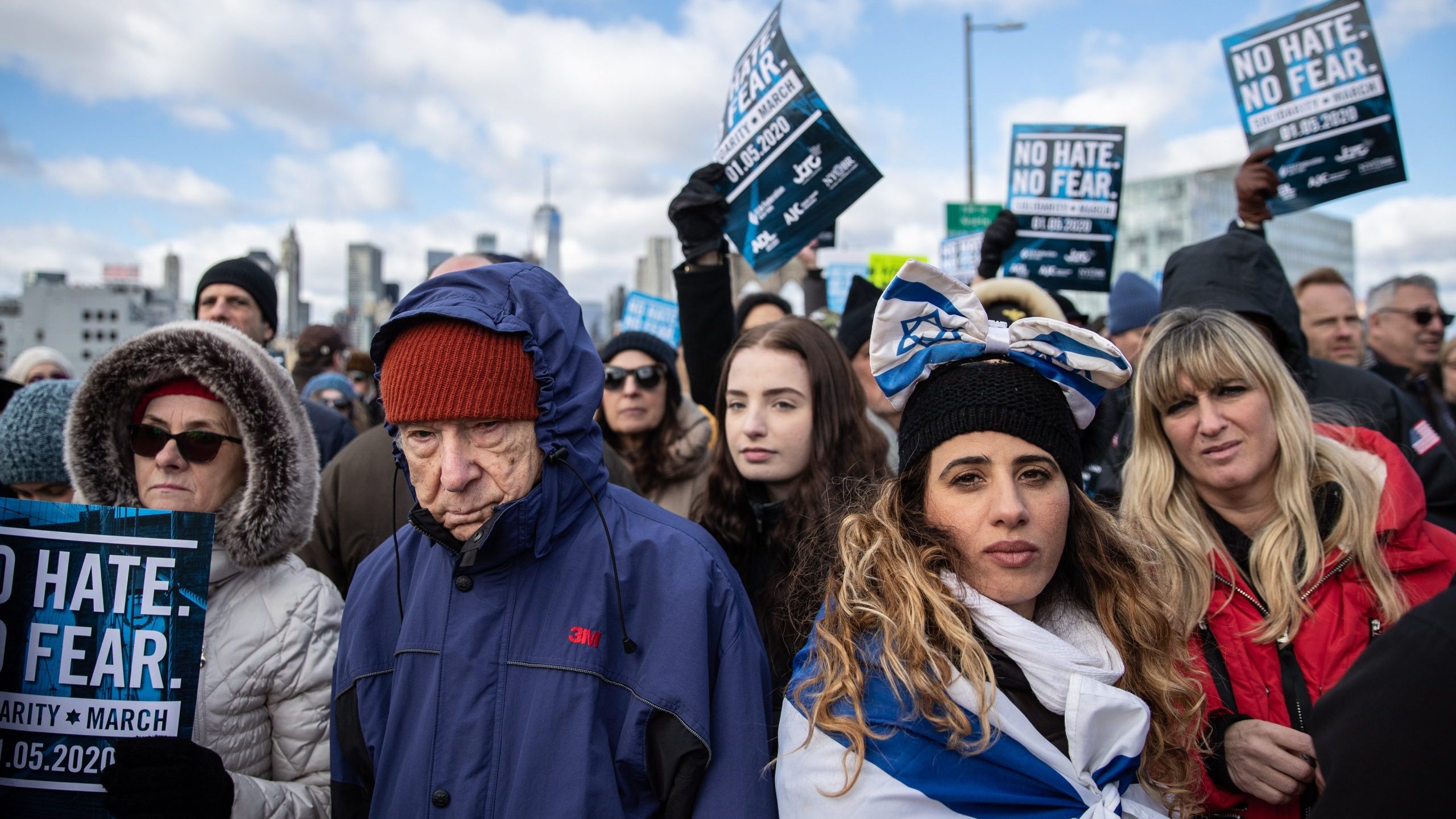 People participate in a Jewish solidarity march across the Brooklyn Bridge in New York City on Jan. 5, 2020. (Credit: Jeenah Moon / Getty Images)