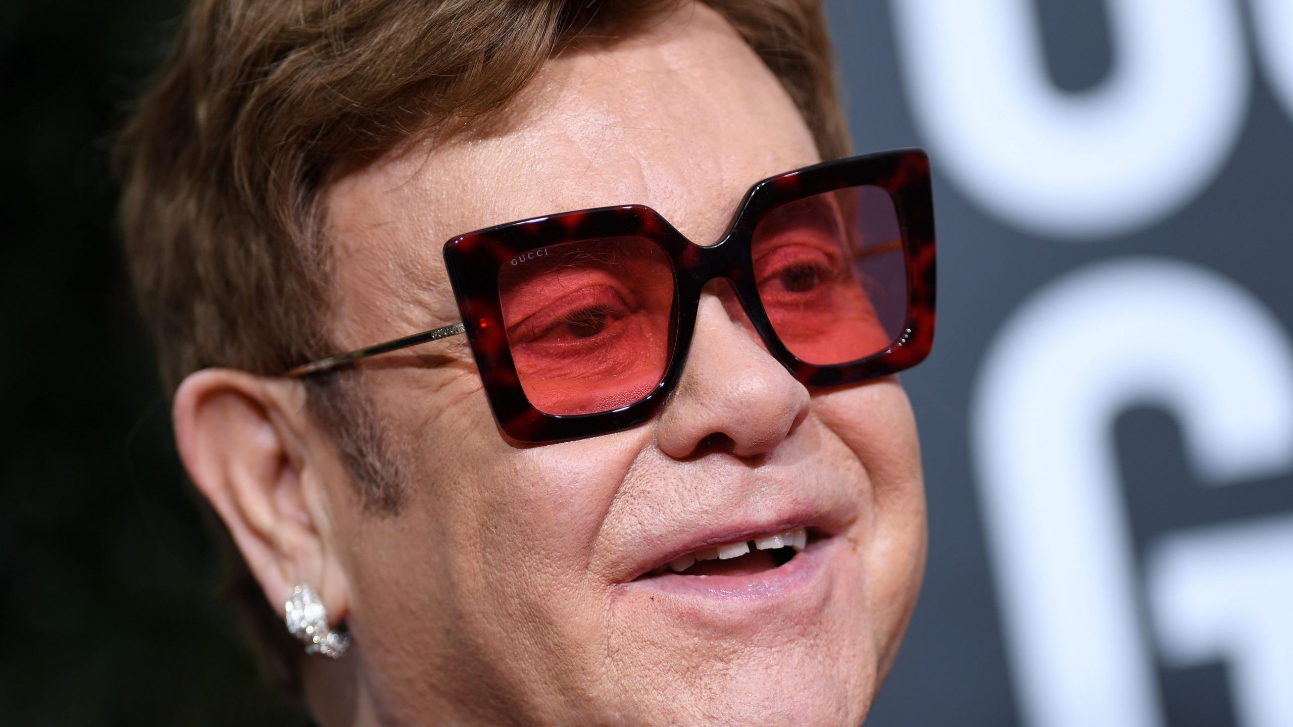 British musician Elton John arrives for the 77th annual Golden Globe Awards on Jan. 5, 2020, at The Beverly Hilton (Credit: VALERIE MACON/AFP via Getty Images)