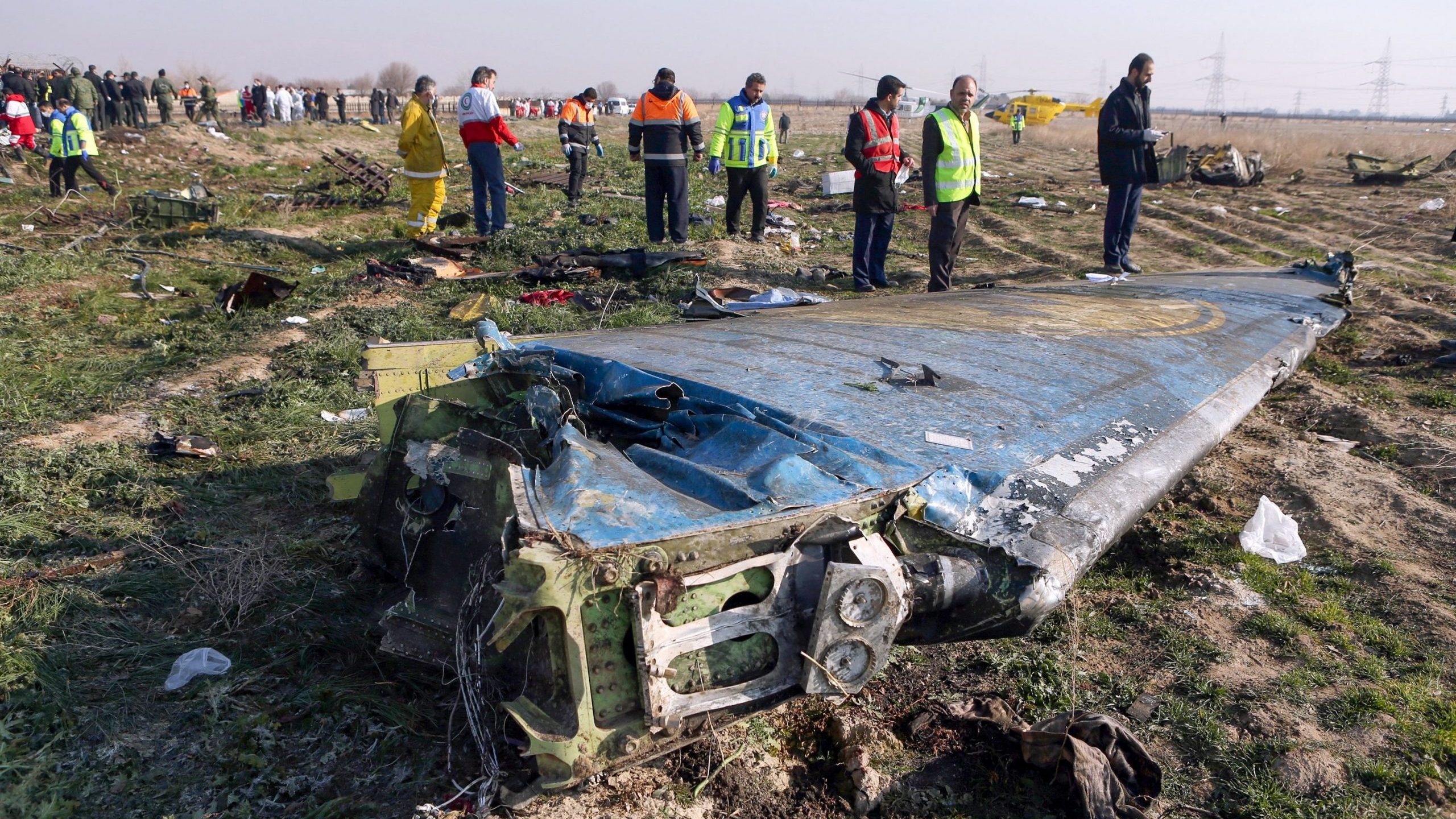 Rescue teams respond to the scene of a Ukrainian airliner that crashed shortly after takeoff from Imam Khomeini airport in the Iranian capital Tehran on Jan. 8, 2020. (Credit: Akbar Tavakoli / IRNA / AFP / Getty Images)