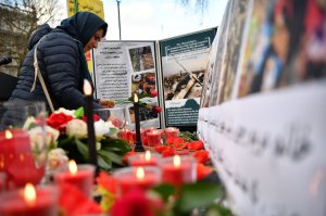 Demonstrators from the Anglo-Iranian Communities in the U.K. attend a vigil opposite the gates of 10 Downing Street in central London on Jan.10, 2020, for the victims of the Ukrainian airliner that crashed on Jan. 8, killing all 176 onboard. (Credit: BEN STANSALL/AFP via Getty Images)