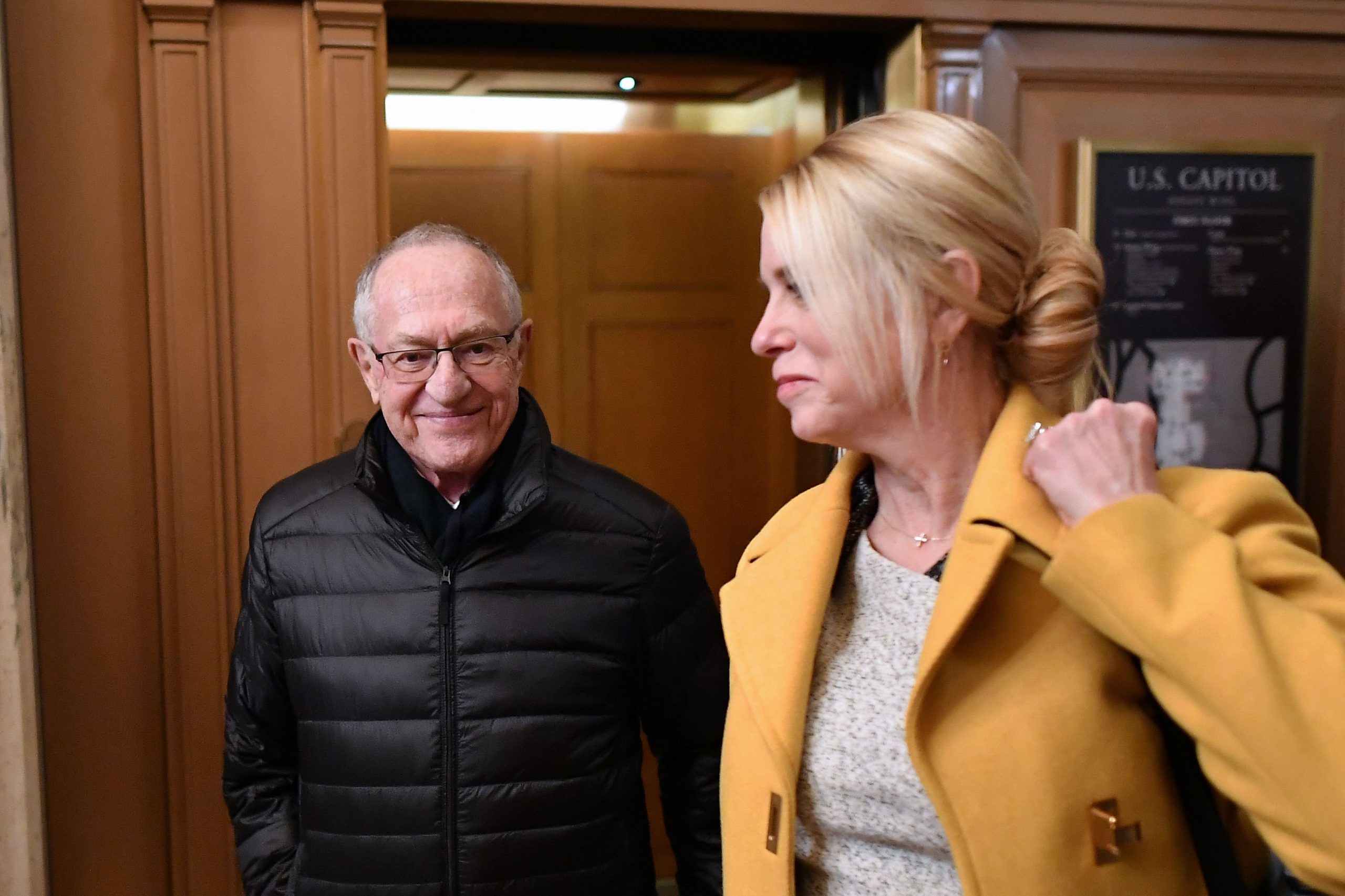 US President Donald Trump lawyers Alan Dershowitz (L) and Pam Bondi depart the Senate chamber after the impeachment trial of US President Donald Trump at the US Capitol in Washington, DC on January 27, 2020. (Credit: MANDEL NGAN/AFP via Getty Images)