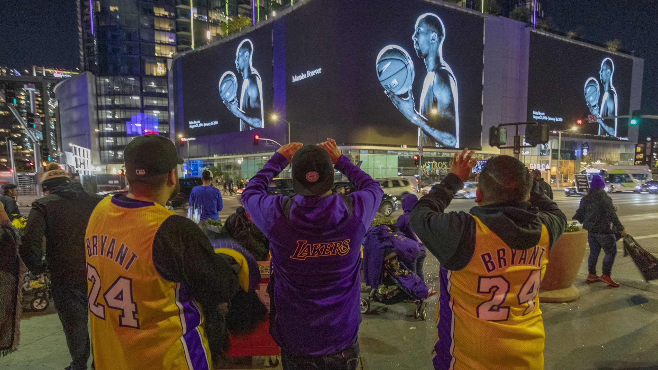 On Jan. 28, 2020, signs in downtown Los Angeles memorialize NBA great Kobe Bryant, who along with his 13-year-old daughter, Gianna, died in a helicopter crash two days earlier. Kobe and "Gigi" were among nine killed in the crash in Calabasas. (Credit: David McNew/Getty Images)