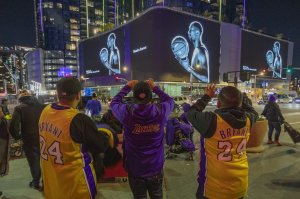 On Jan. 28, 2020, signs in downtown Los Angeles memorialize NBA great Kobe Bryant, who along with his 13-year-old daughter, Gianna, died in a helicopter crash two days earlier. Kobe and "Gigi" were among nine killed in the crash in Calabasas. (Credit: David McNew/Getty Images)