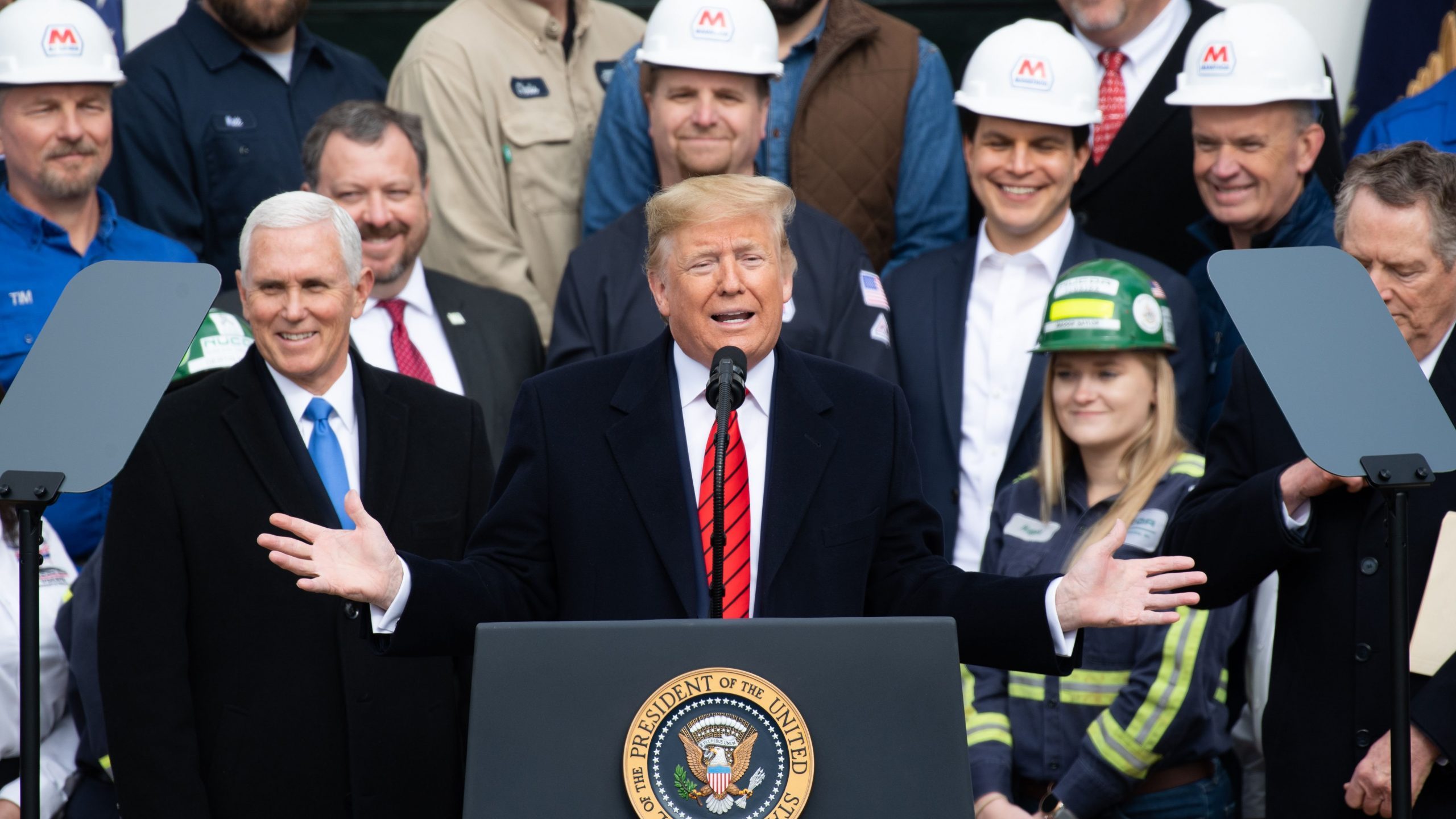 Donald Trump gestures before signing the United States-Mexico-Canada Trade Agreement, known as USMCA, during a ceremony on the South Lawn of the White House in Washington, D.C., on Jan. 29, 2020. (Credit: SAUL LOEB/AFP via Getty Images)