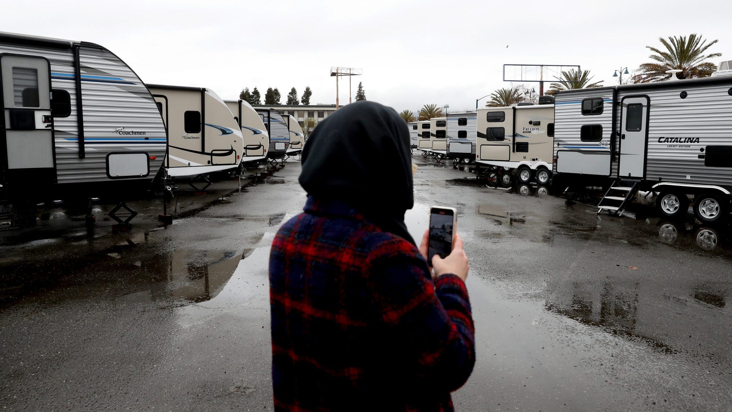 FEMA trailers are displayed in Oakland before a press conference with California Gov. Gavin Newsom and Oakland Mayor Libby Schaaf about the state's actions to address homelessness on Jan. 16, 2020. (Credit: Justin Sullivan / Getty Images)