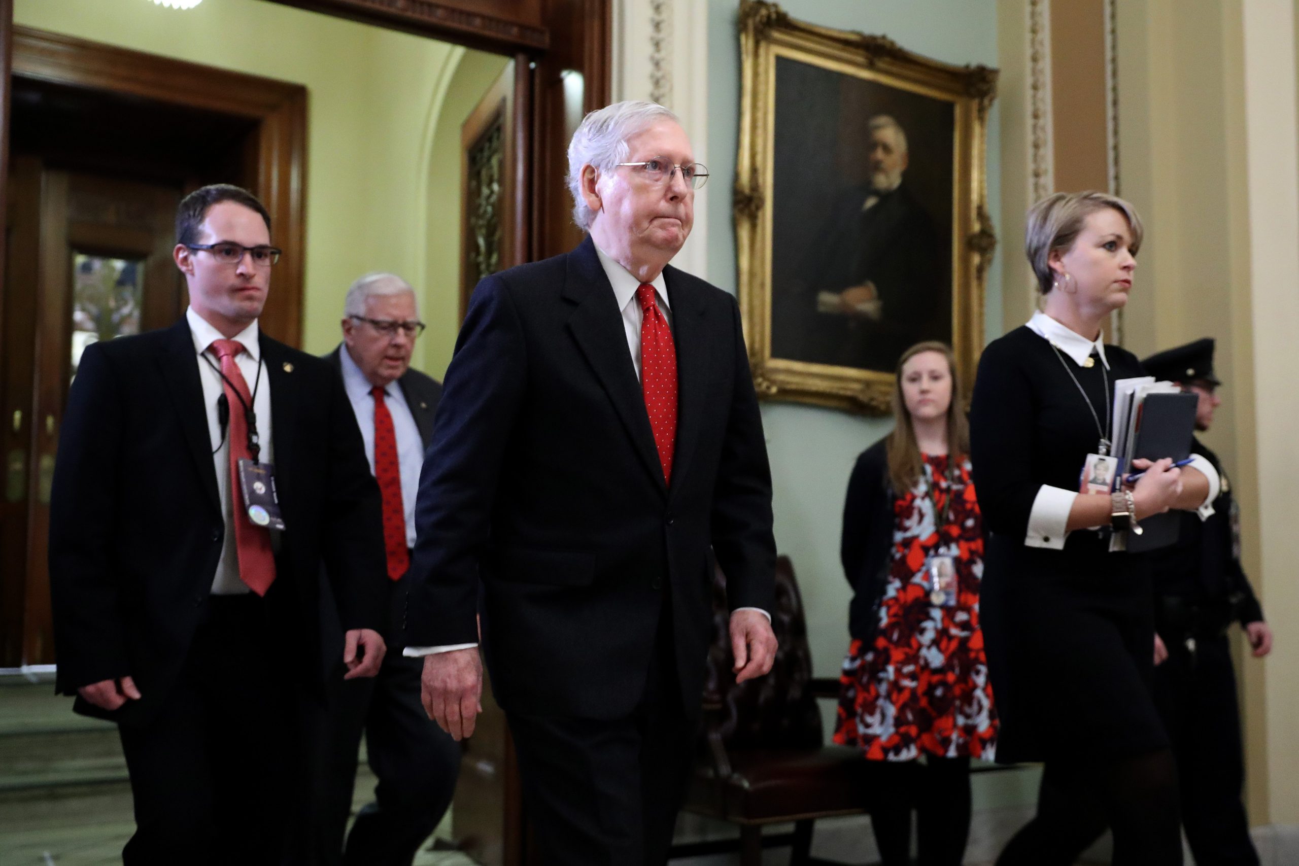 Senate Majority Leader Mitch McConnell leaves the Senate Chamber during a recess in President Donald Trump's impeachment trial on Jan. 21, 2020. (Credit: Chip Somodevilla / Getty Images)