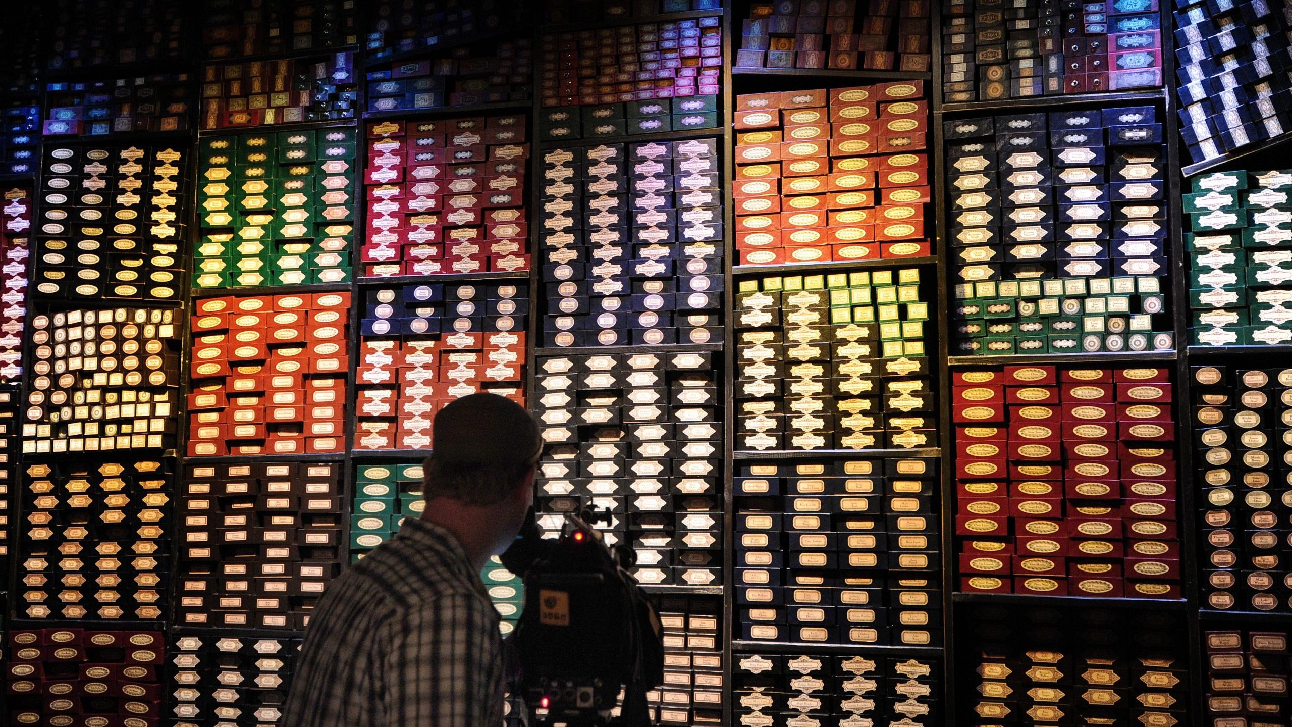 A display of wand boxes during at the Warner Bros. Harry Potter studio tour in north London on March 26, 2012. (Credit: Carl Court/AFP via Getty Images)