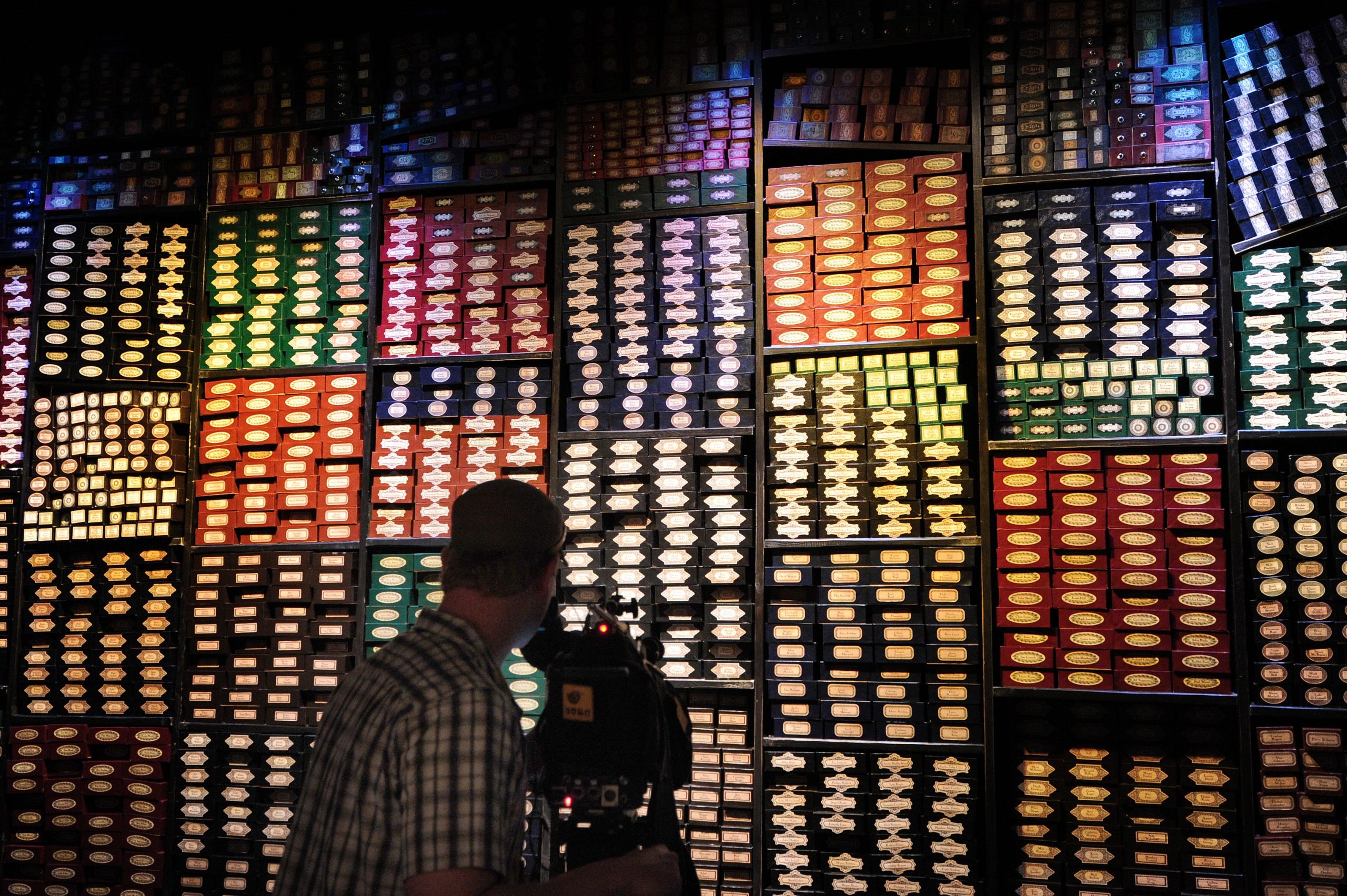 A display of wand boxes during at the Warner Bros. Harry Potter studio tour in north London on March 26, 2012. (Credit: Carl Court/AFP via Getty Images)