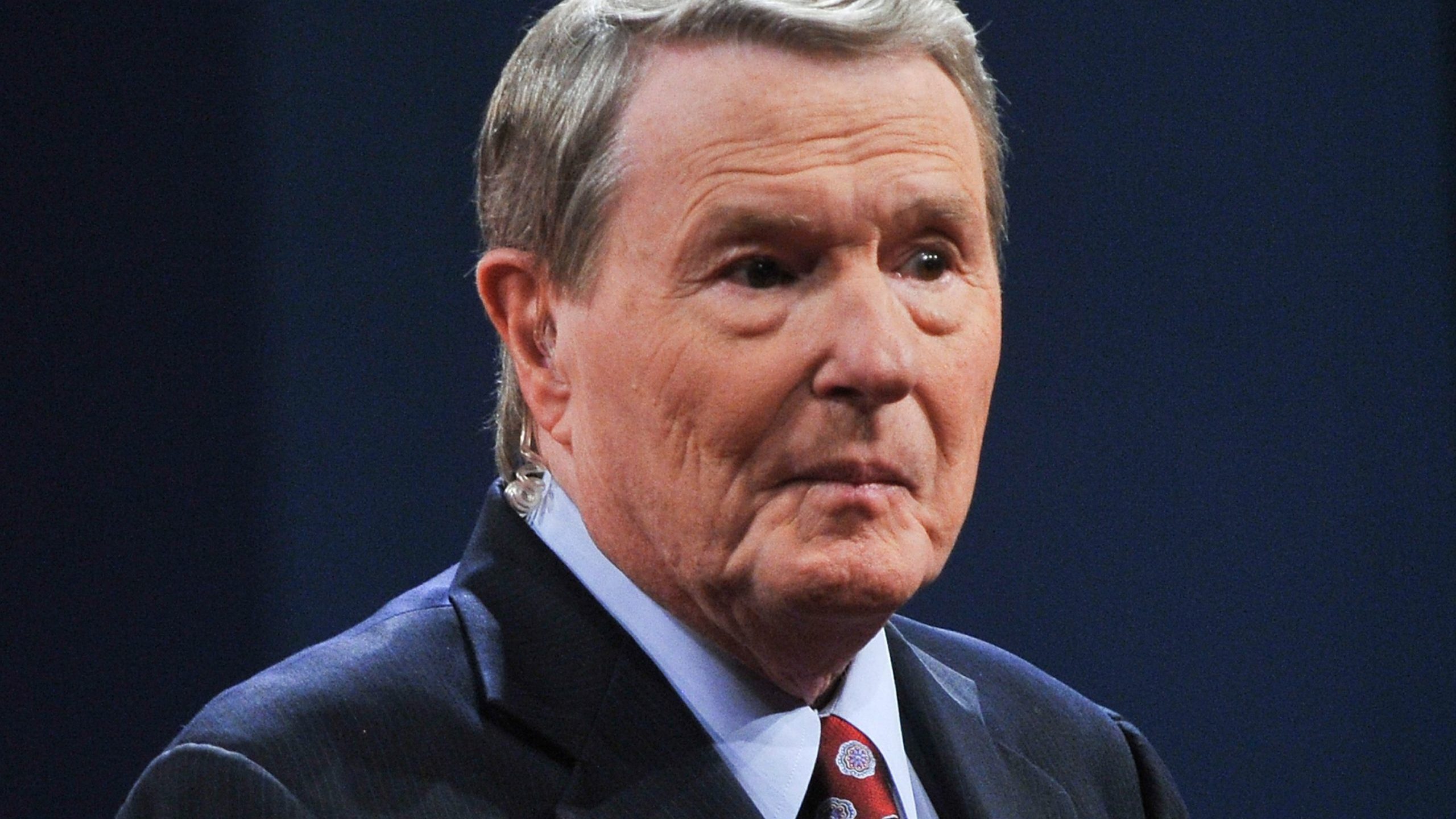 Jim Lehrer speaks to the audience before moderating the first presidential debate between President Barack Obama and Republican Mitt Romney in Denver on Oct. 3, 2012. (Credit: NICHOLAS KAMM/AFP/GettyImages)