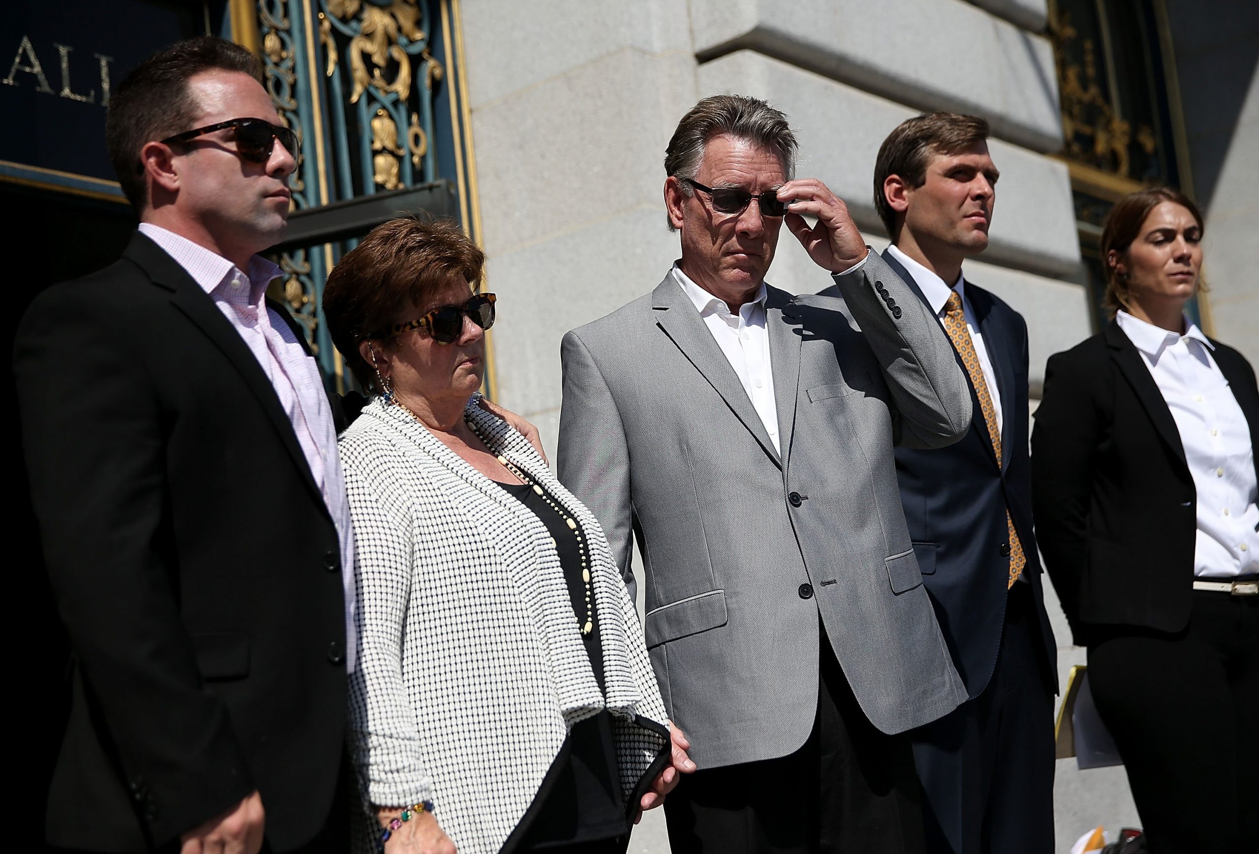 From left: Brad Steinle, Liz Sullivan and Jim Steinle, the family of Kate Steinle, look on during a news conference in San Francisco announcing their lawsuit against the government on Sept. 1, 2015. (Credit: Justin Sullivan / Getty Images)