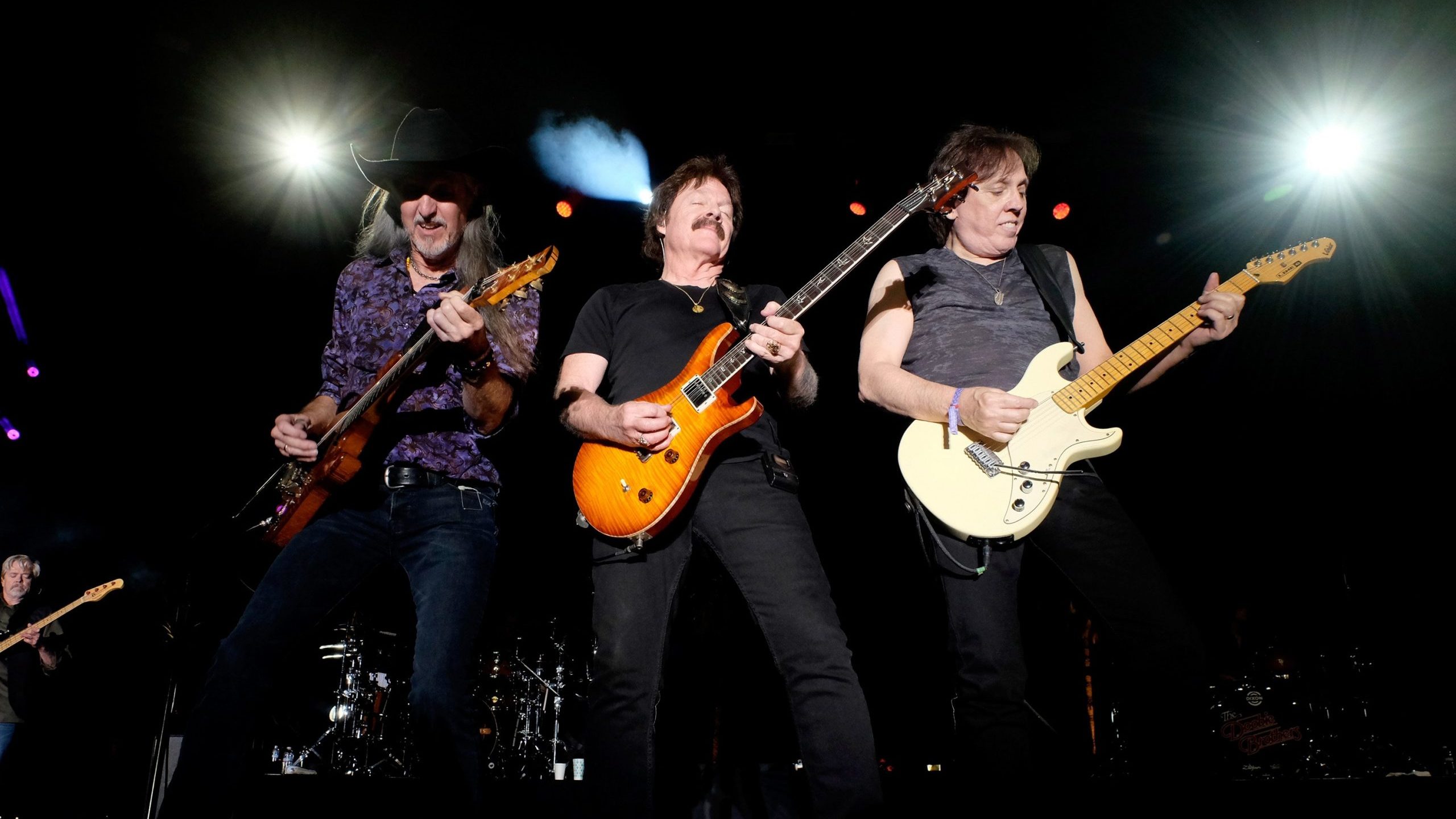 Musicians Patrick Simmons, Tom Johnston and John McFee of The Doobie Brothers perform onstage during 2016 Stagecoach California's Country Music Festival at Empire Polo Club on May 01, 2016 in Indio, California. (Credit: Frazer Harrison/Getty Images for Stagecoach)