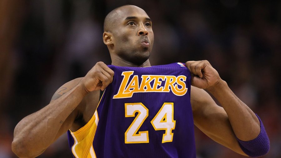 Kobe Bryant adjusts his jersey during the NBA game against the Phoenix Suns at US Airways Center on Feb. 19, 2012, in Phoenix. (Credit: Christian Petersen/Getty Images)